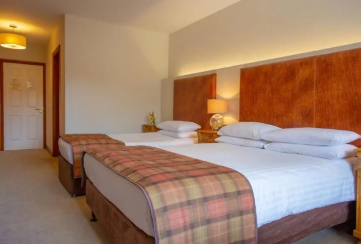 Bed in Lydons Lodge Hotel