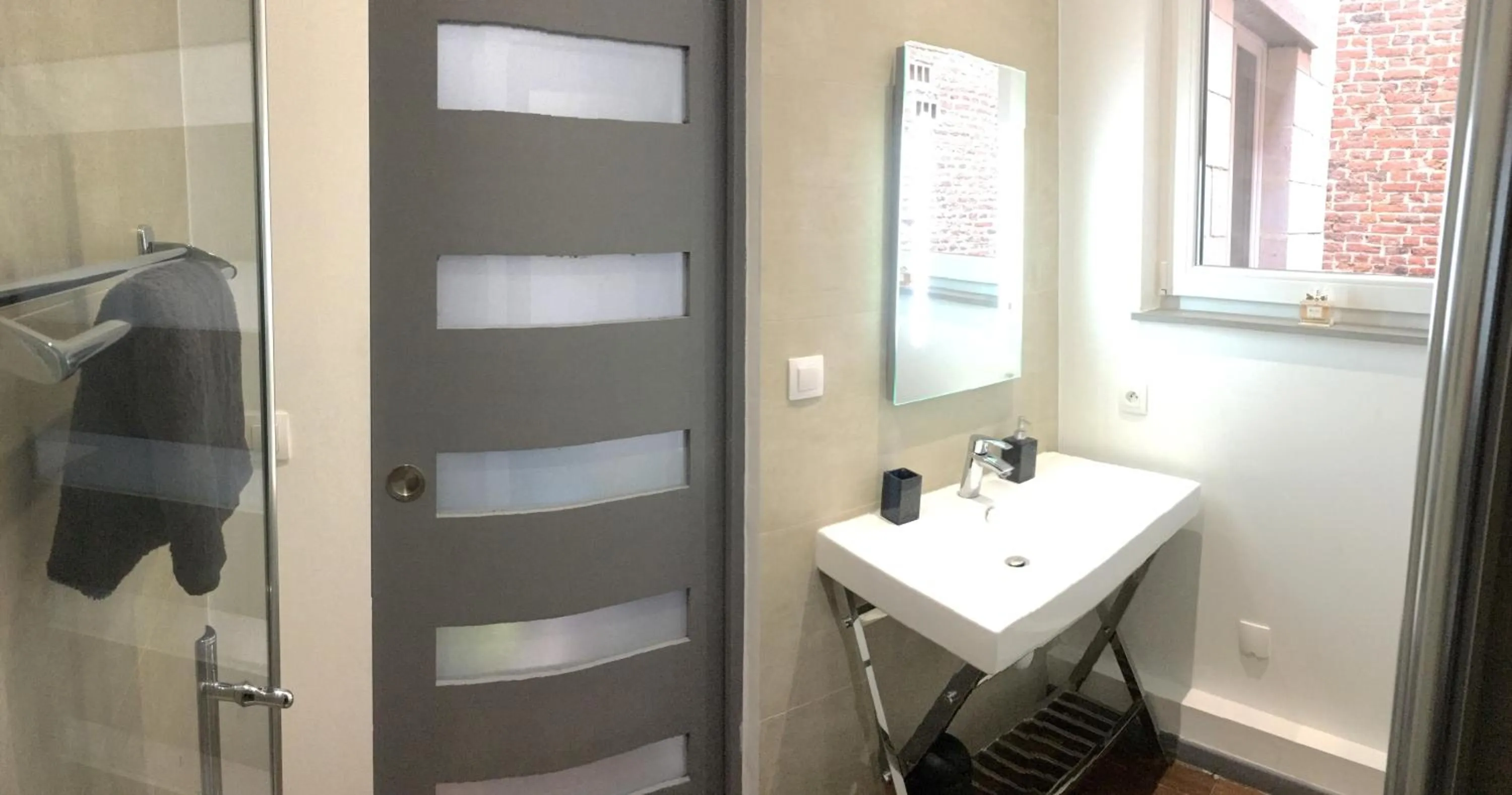 Bathroom in LITTLE PLAZA Appart'Hotel