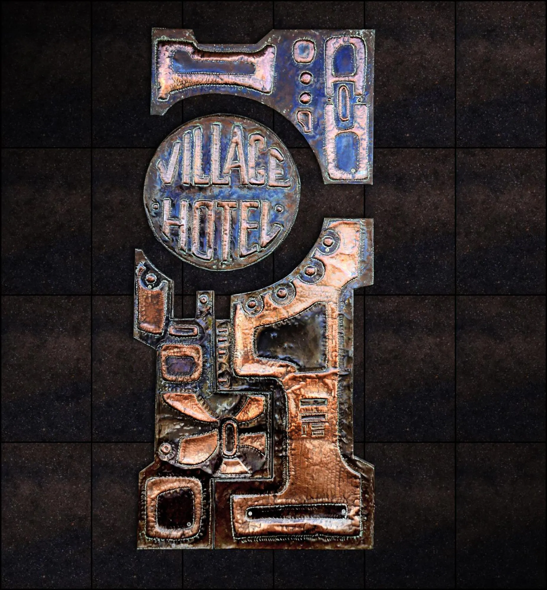 Property logo or sign in Village Hotel