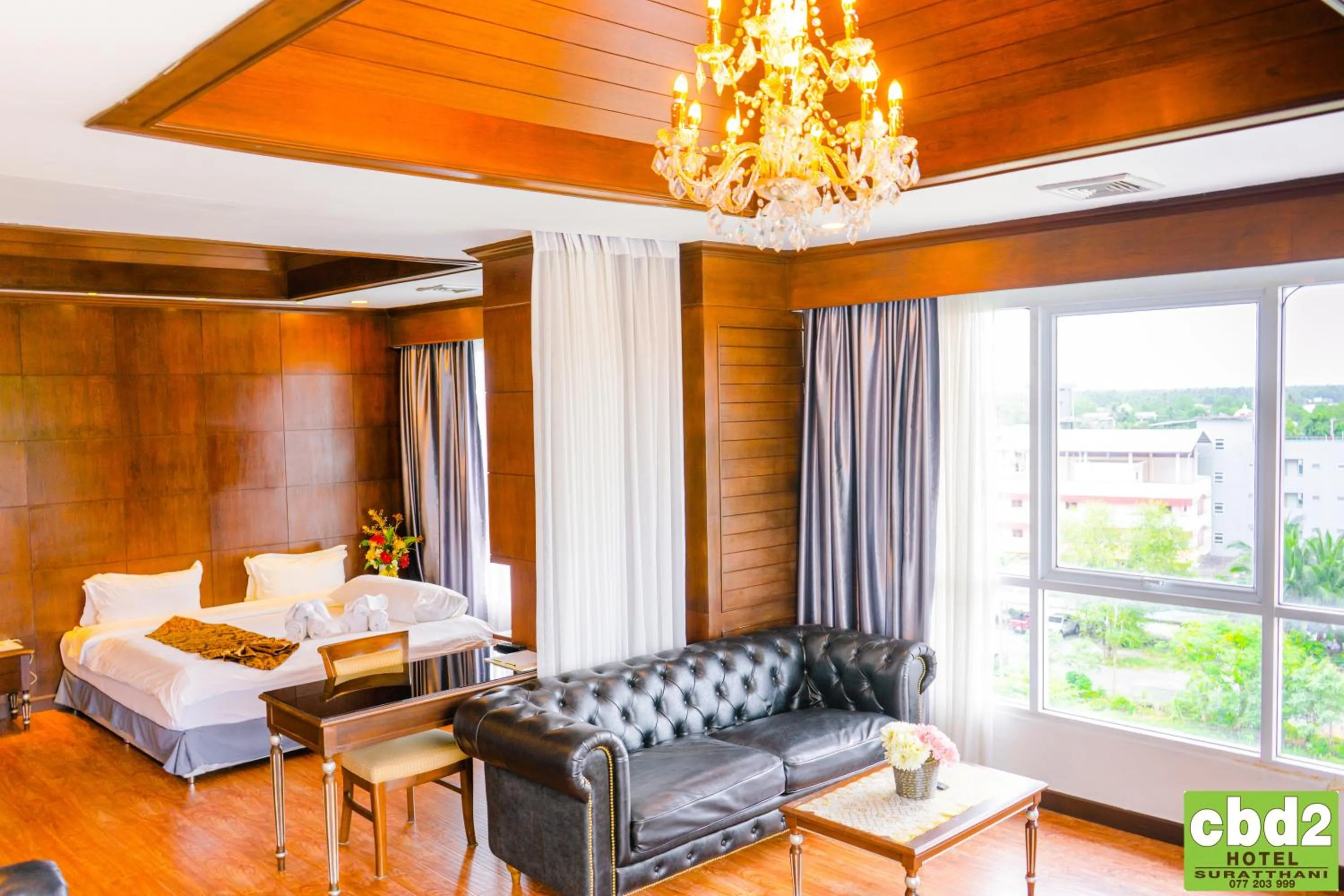 Seating area, Bed in CBD 2 Hotel