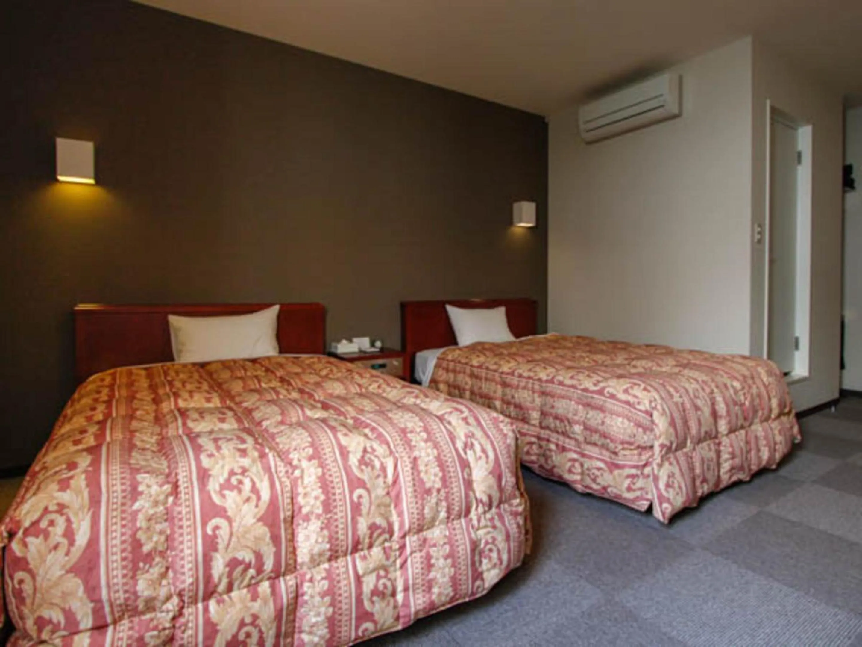 Bed in HOTEL LiVEMAX BUDGET Hamamatsu-Ekimae