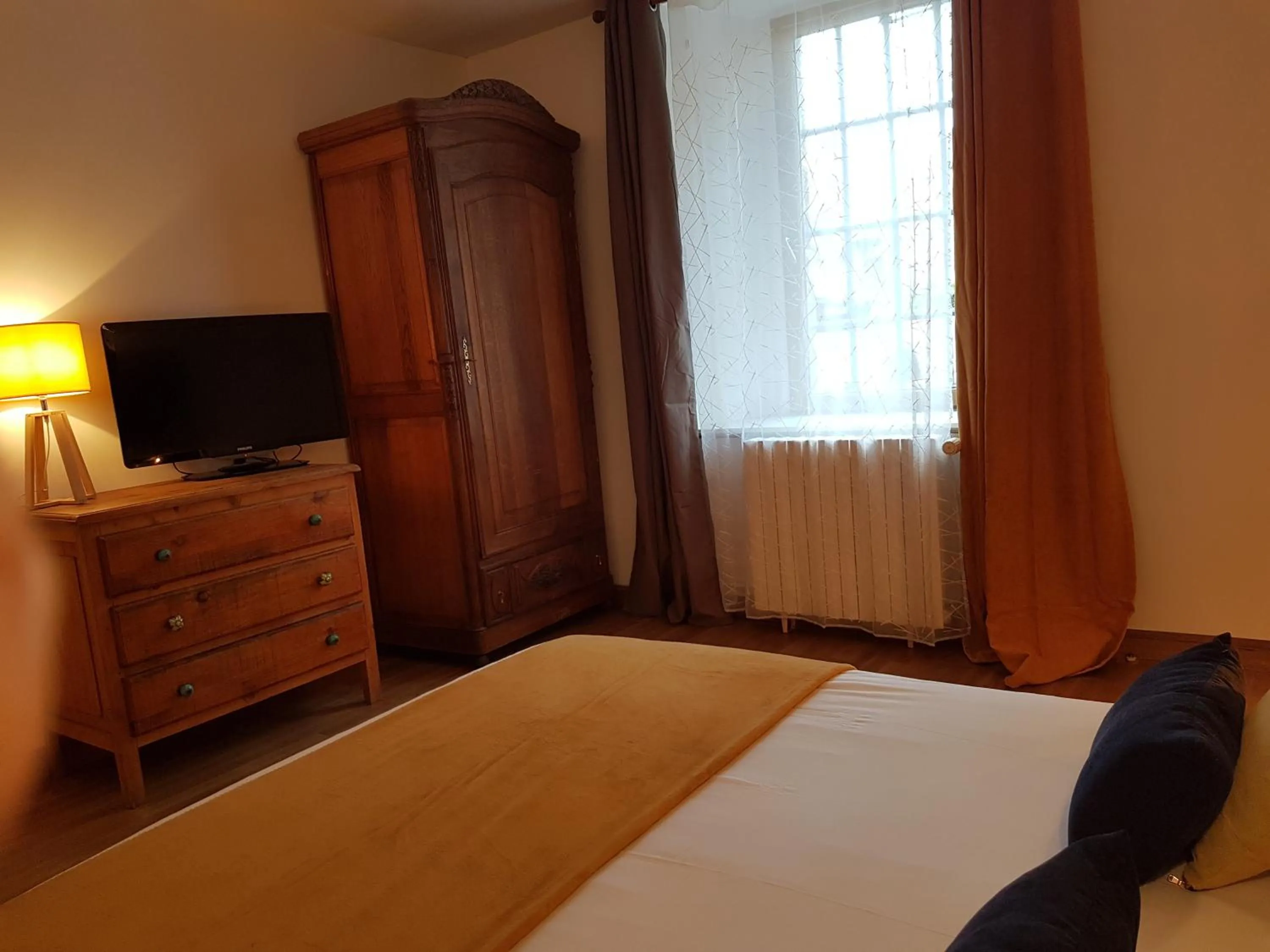 Bed in Les Chambres du Château du Rozel