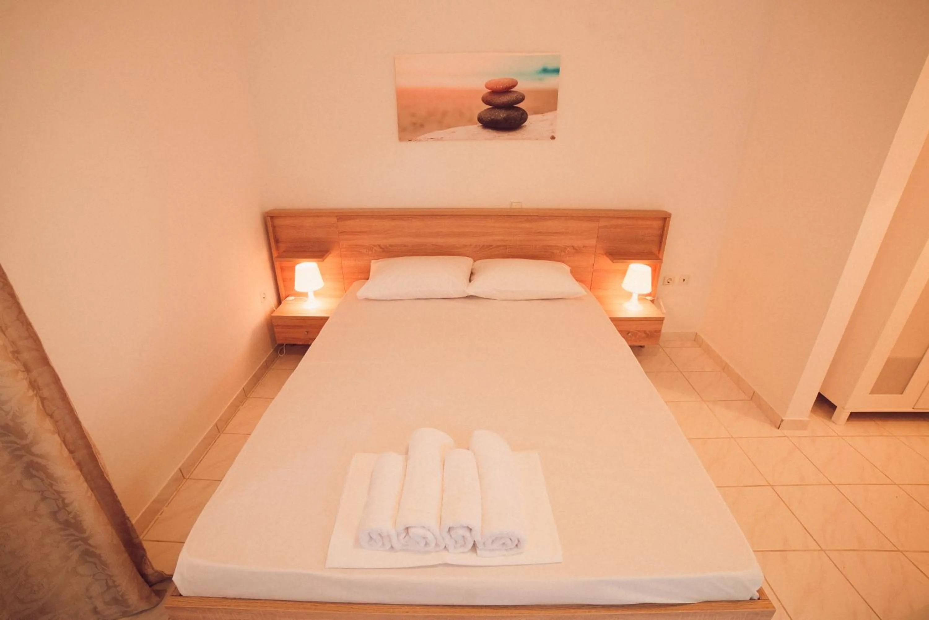 Bed in Nerina Studios Agios Nikitas