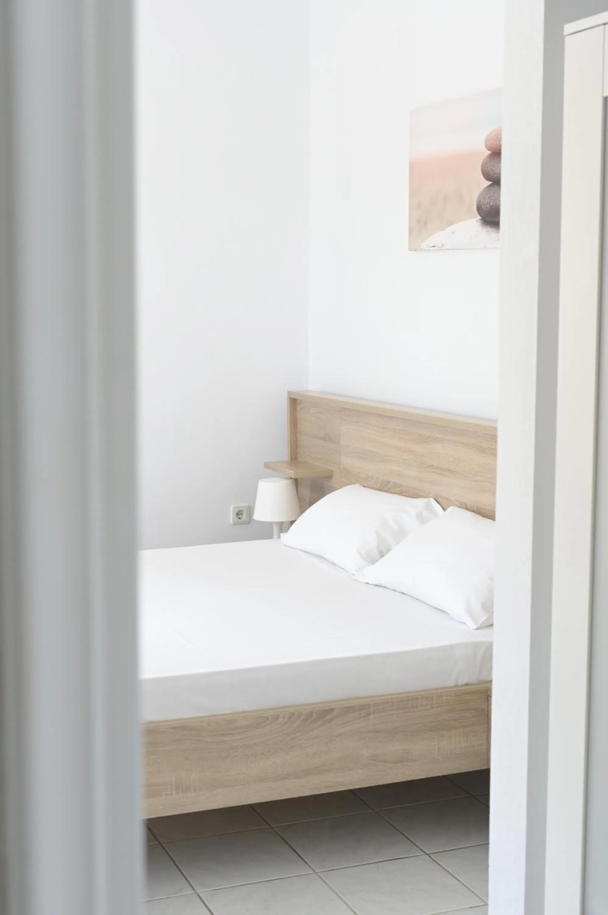 Bed in Nerina Studios Agios Nikitas