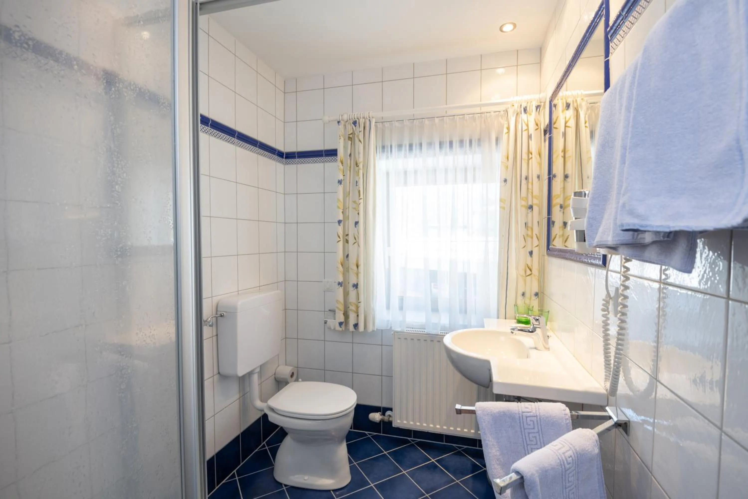 Bathroom in Hotel Hammerwirt - Forellenhof