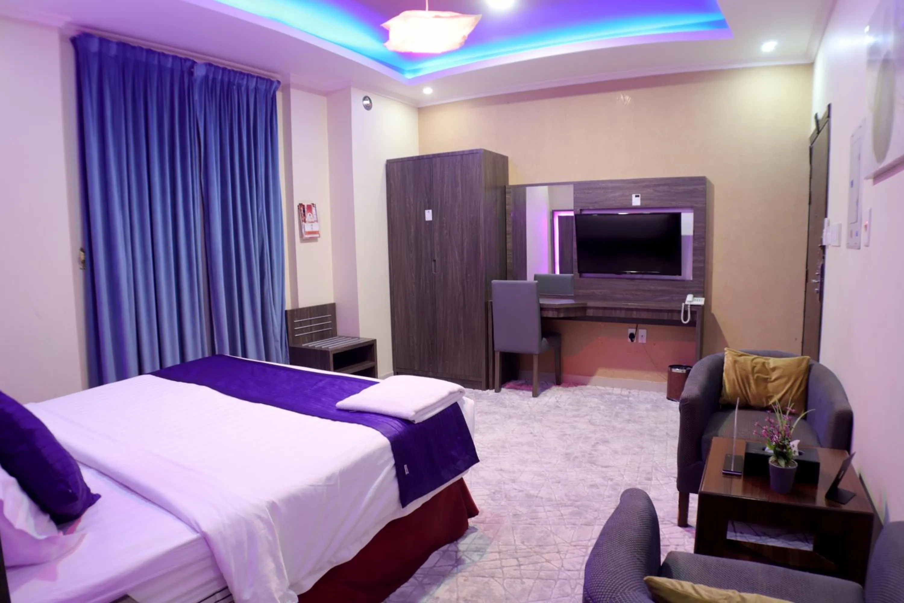 Bed in شقق مسكن الضيافة للشقق المخدومة 2