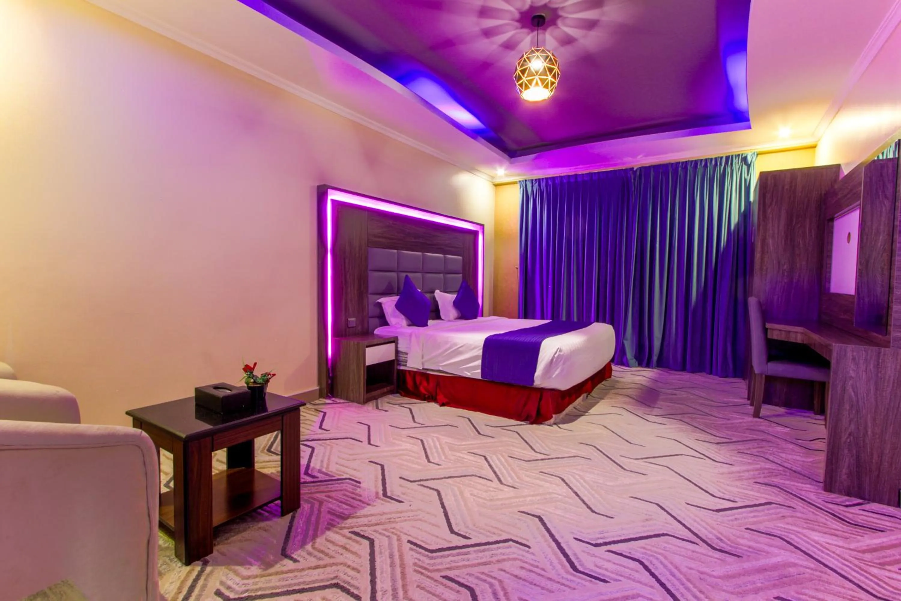 Bed in شقق مسكن الضيافة للشقق المخدومة 2