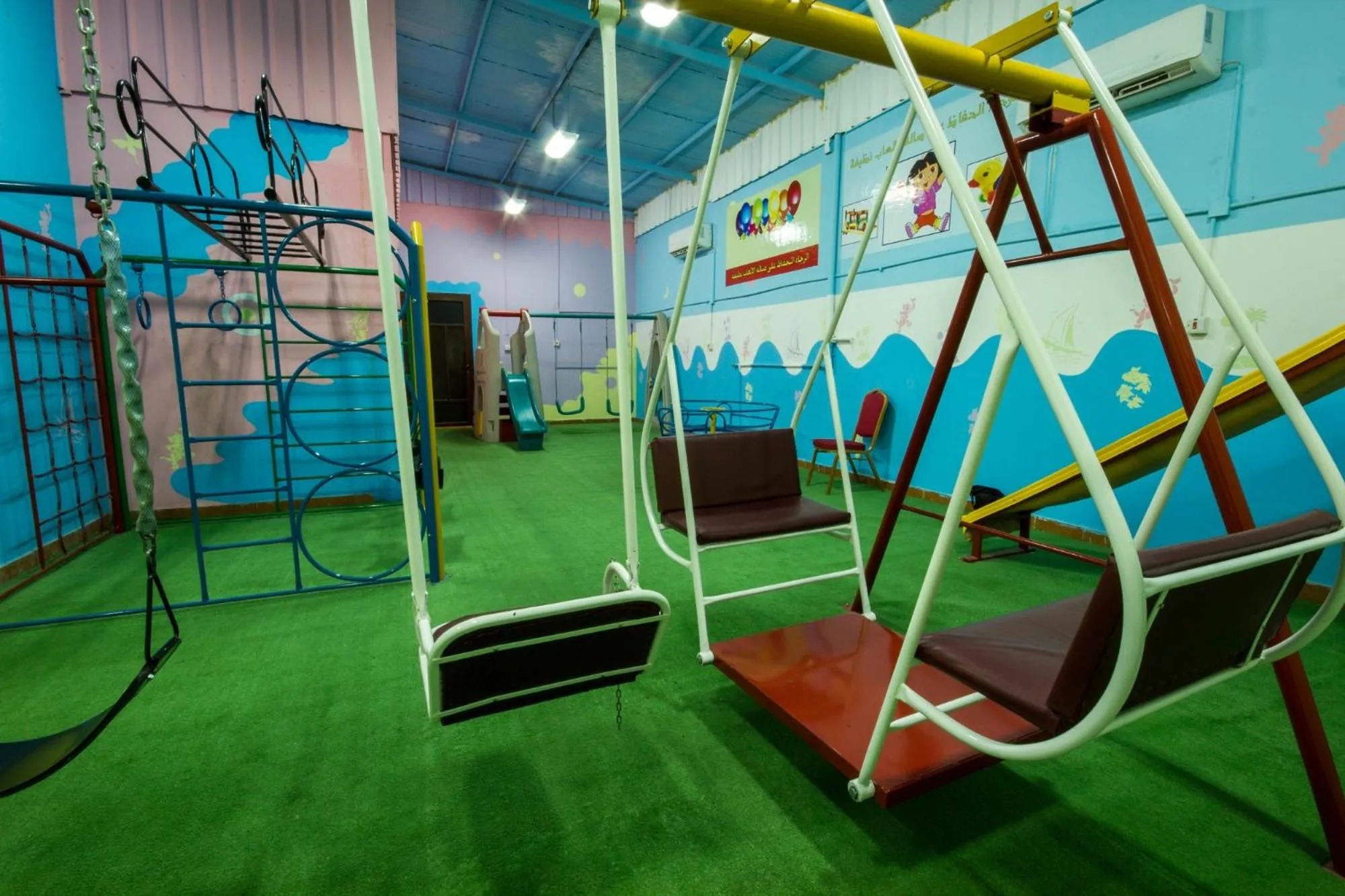 Children play ground in شقق مسكن الضيافة للشقق المخدومة 2
