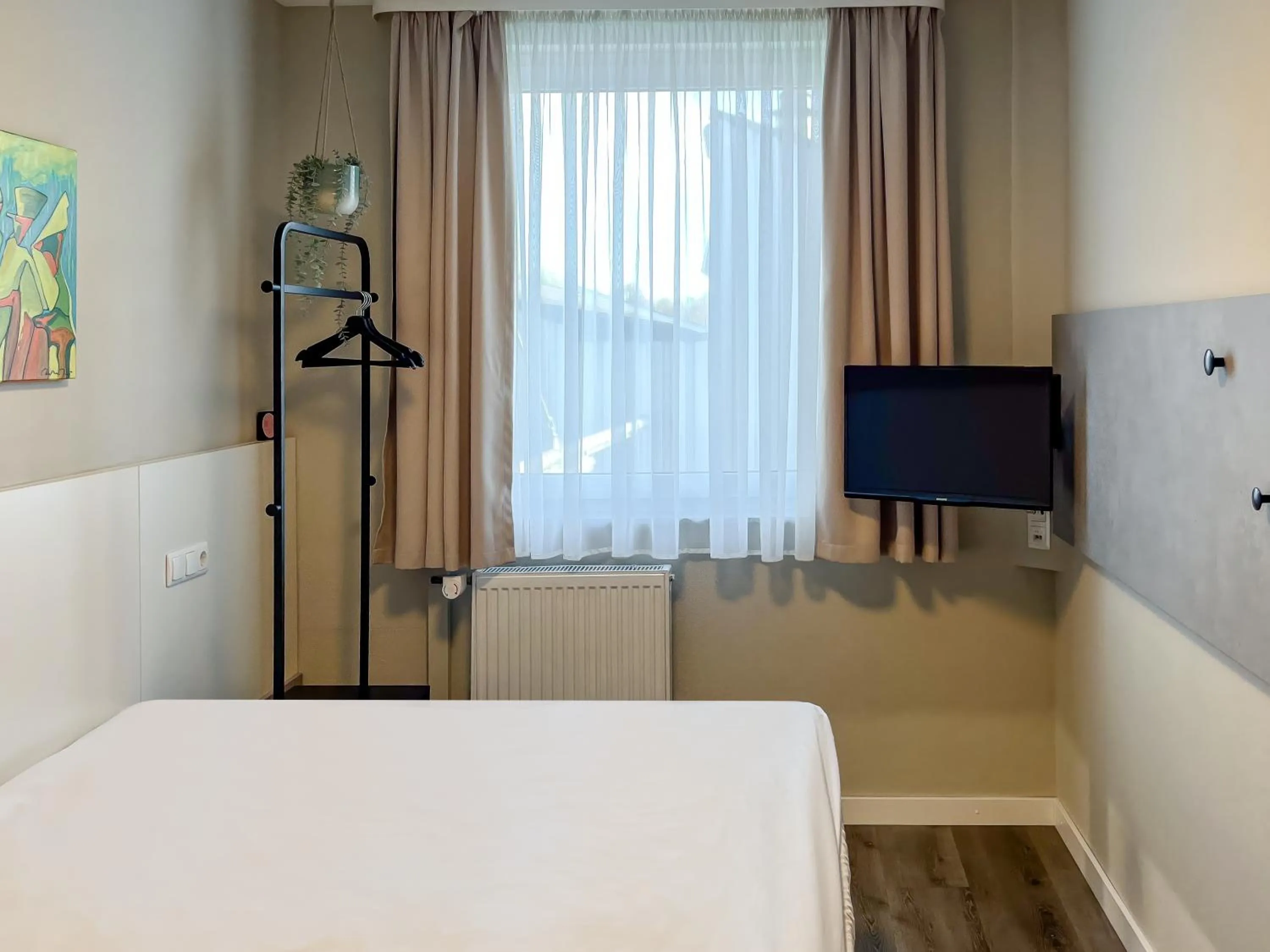 Bed in SleepinRoomz Boutique Hotel