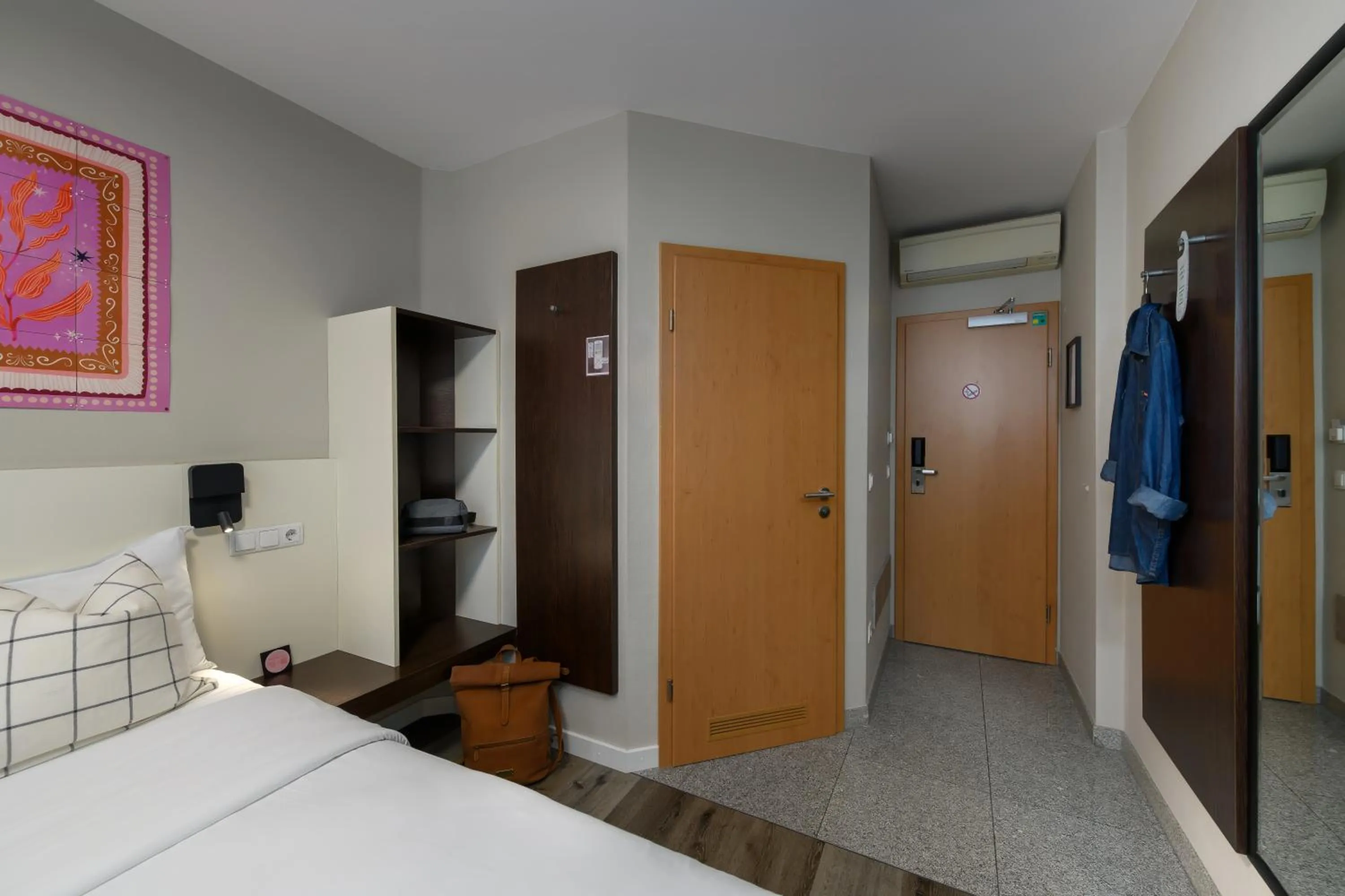 Bed in SleepinRoomz Boutique Hotel