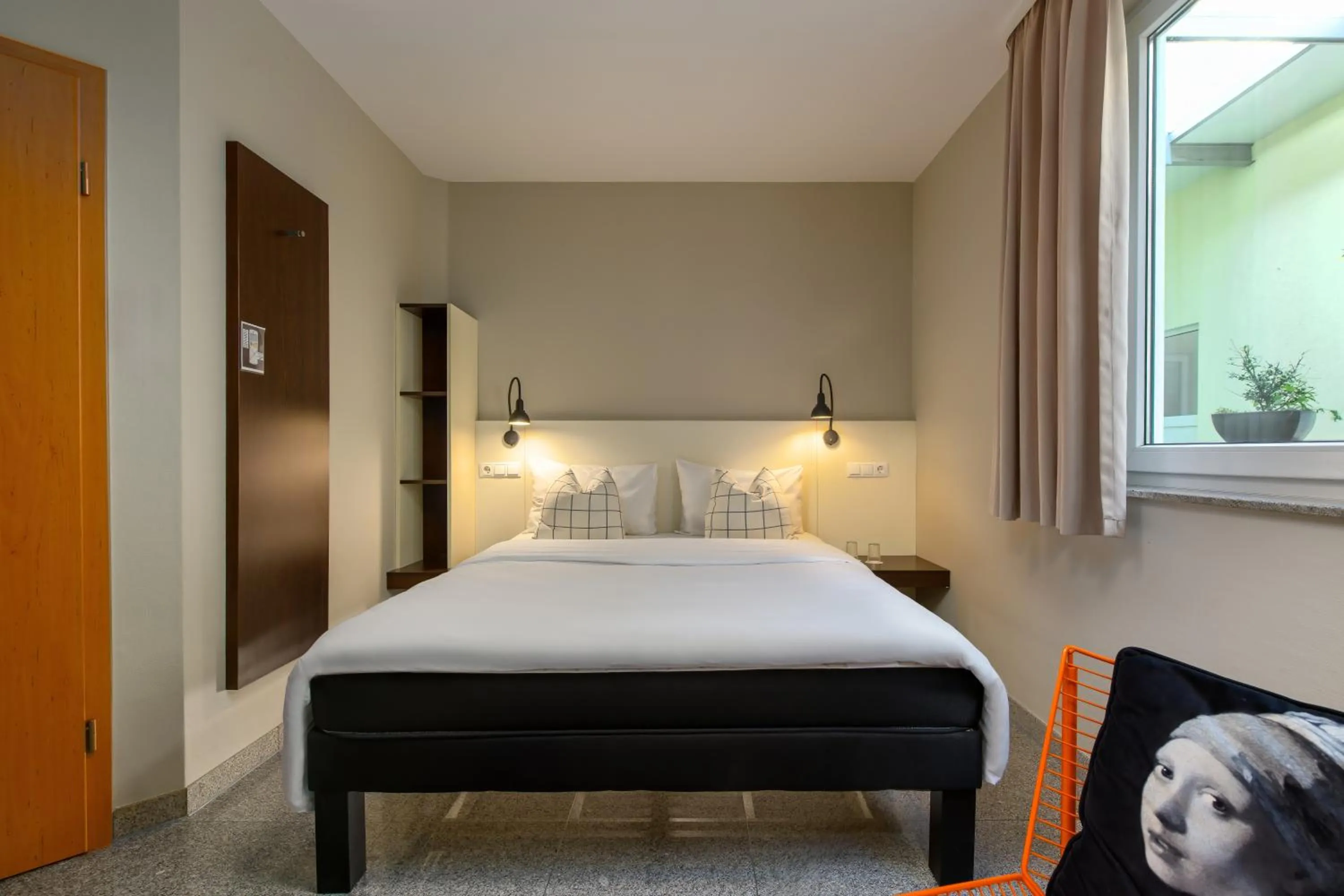 Bed in SleepinRoomz Boutique Hotel