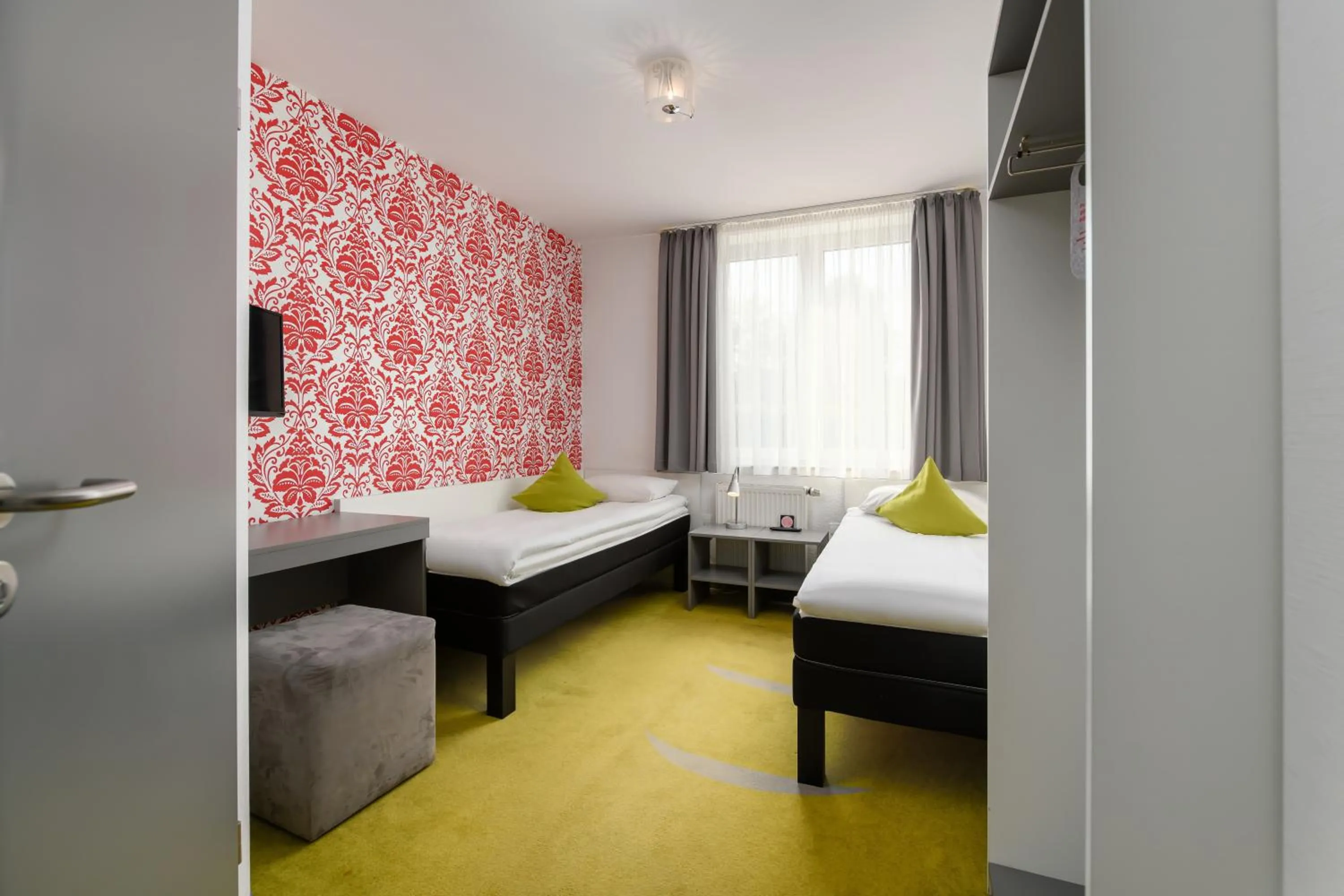 Bed in SleepinRoomz Boutique Hotel