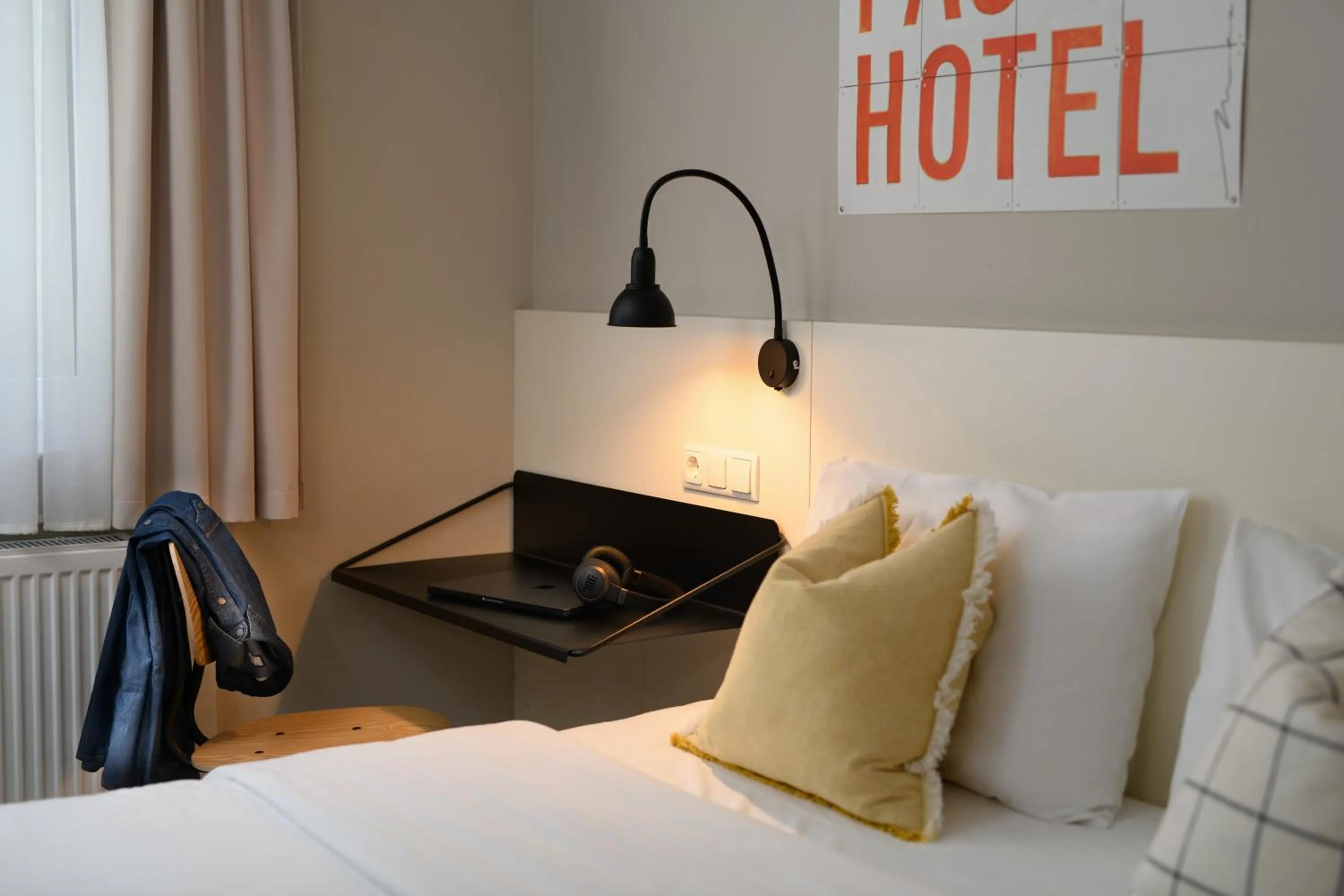 Bed in SleepinRoomz Boutique Hotel