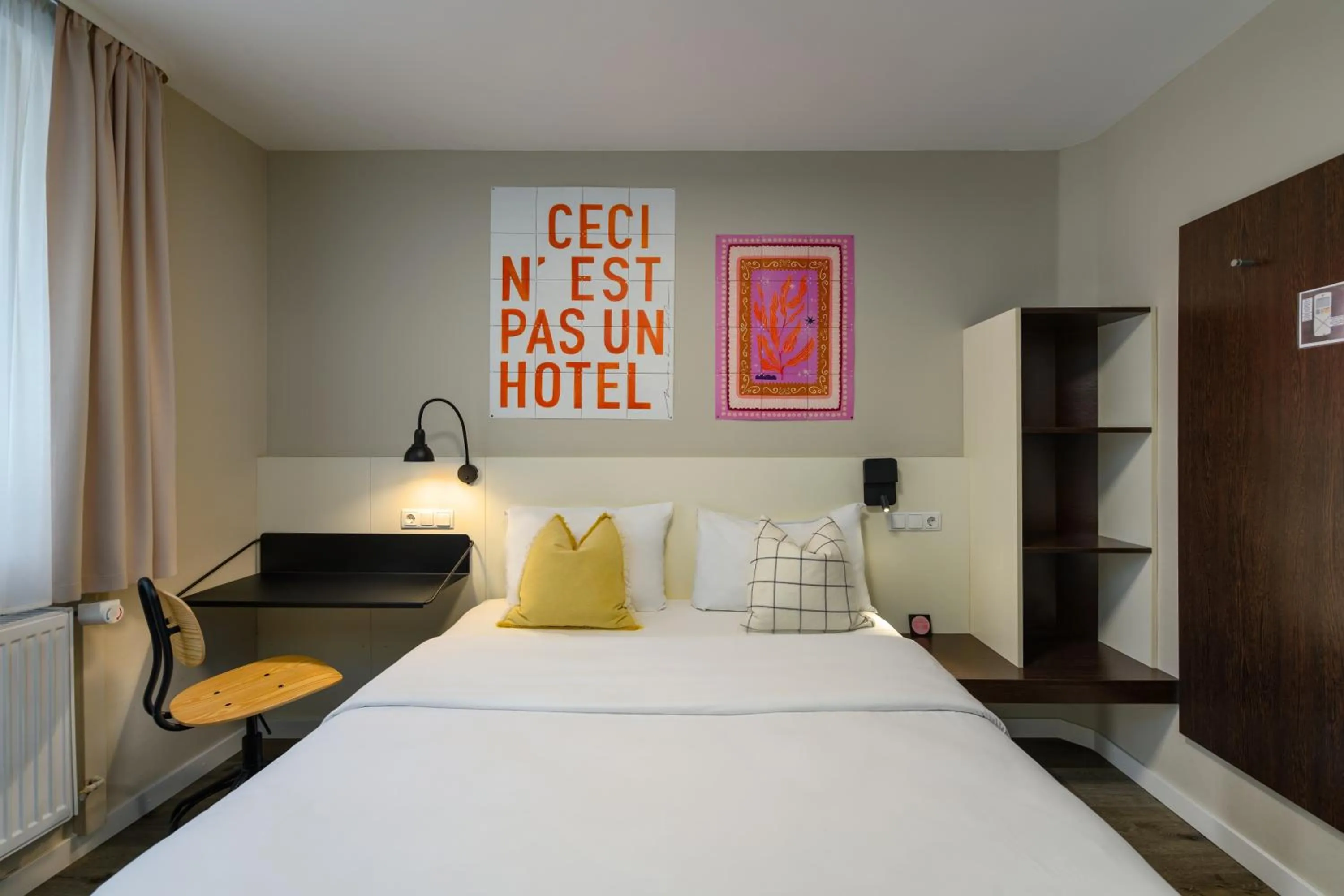 Bed in SleepinRoomz Boutique Hotel