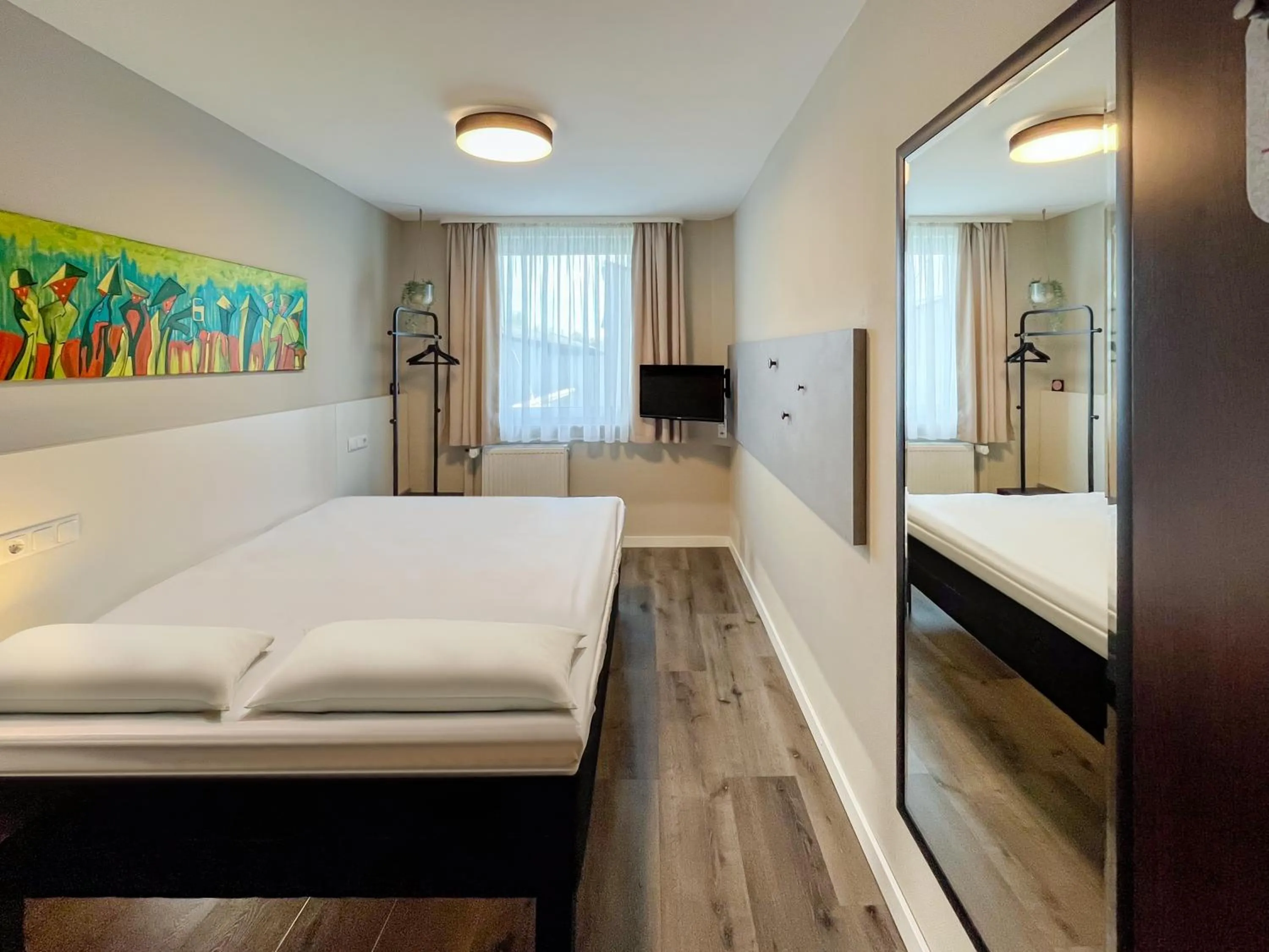 Bed in SleepinRoomz Boutique Hotel