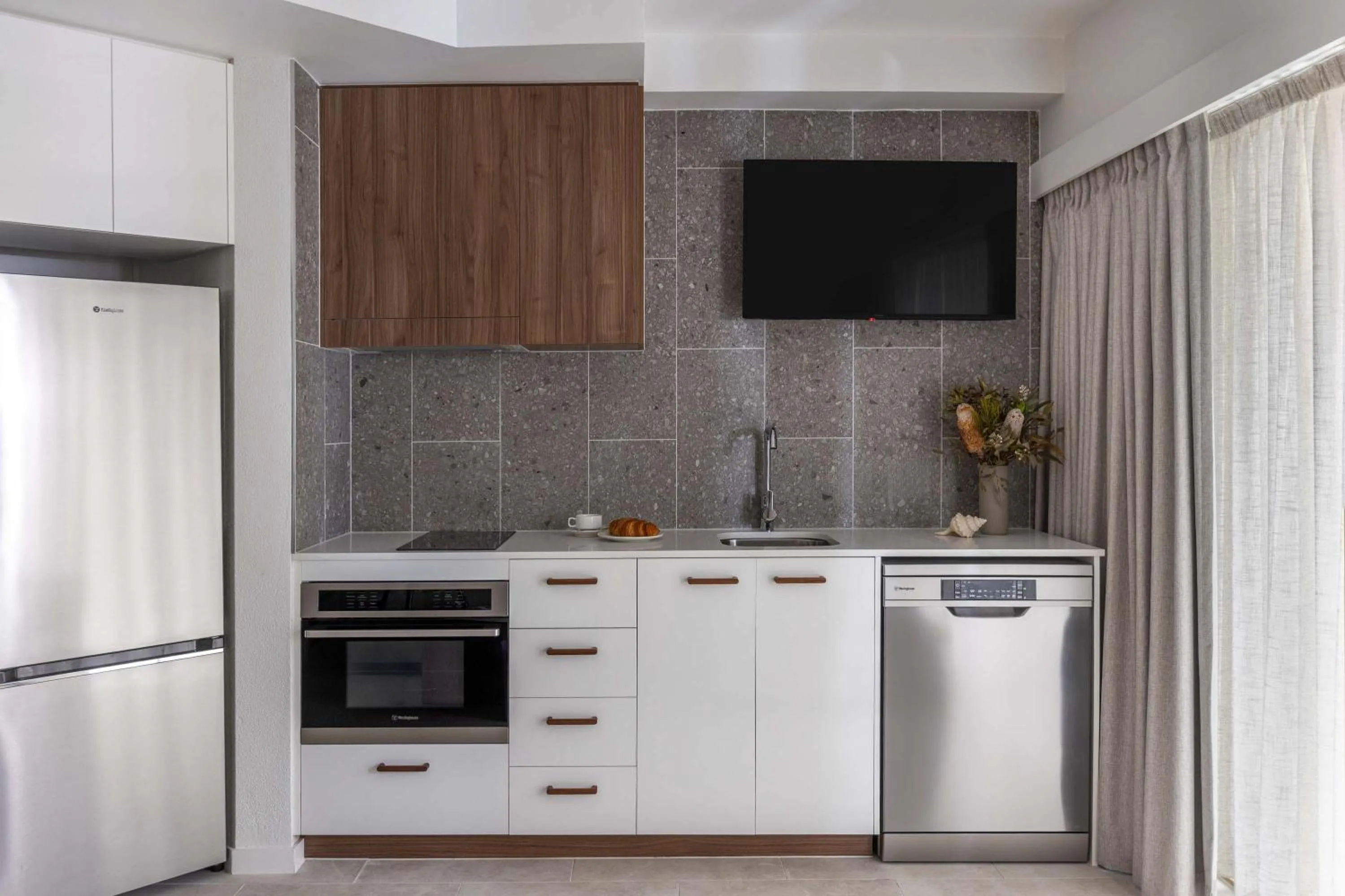 Kitchen or kitchenette in Mantra French Quarter Noosa