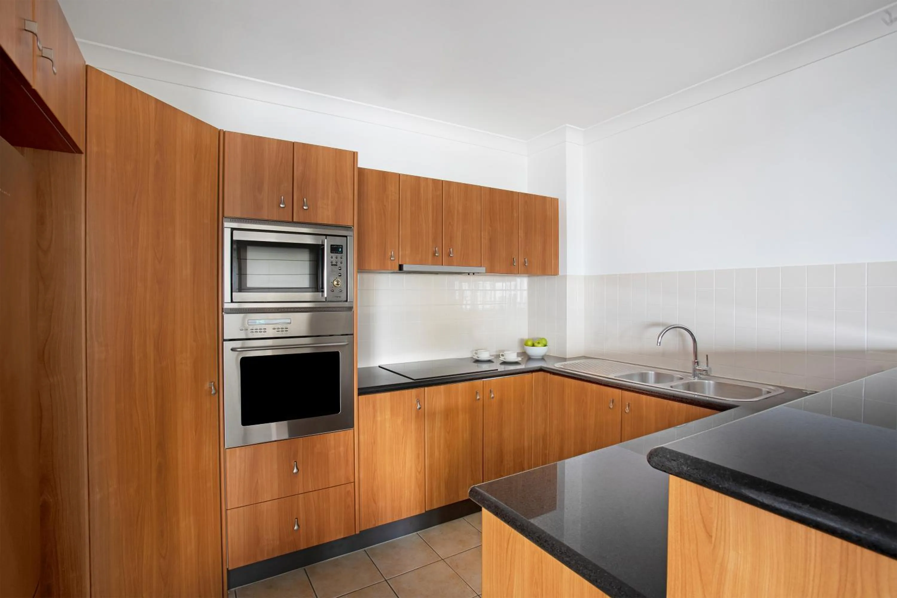 Kitchen or kitchenette in Mantra Esplanade