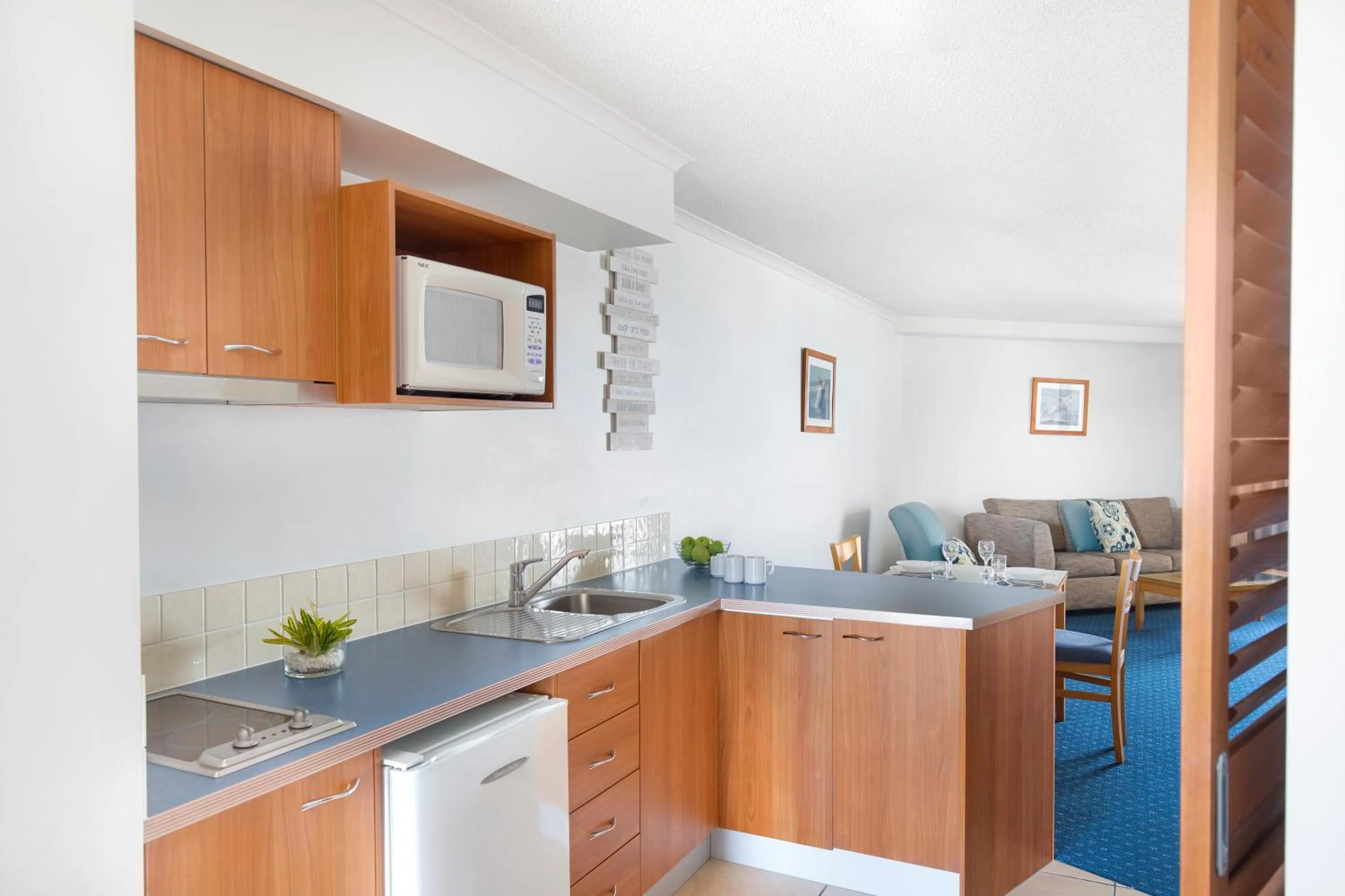 Kitchen or kitchenette in Mantra Hervey Bay