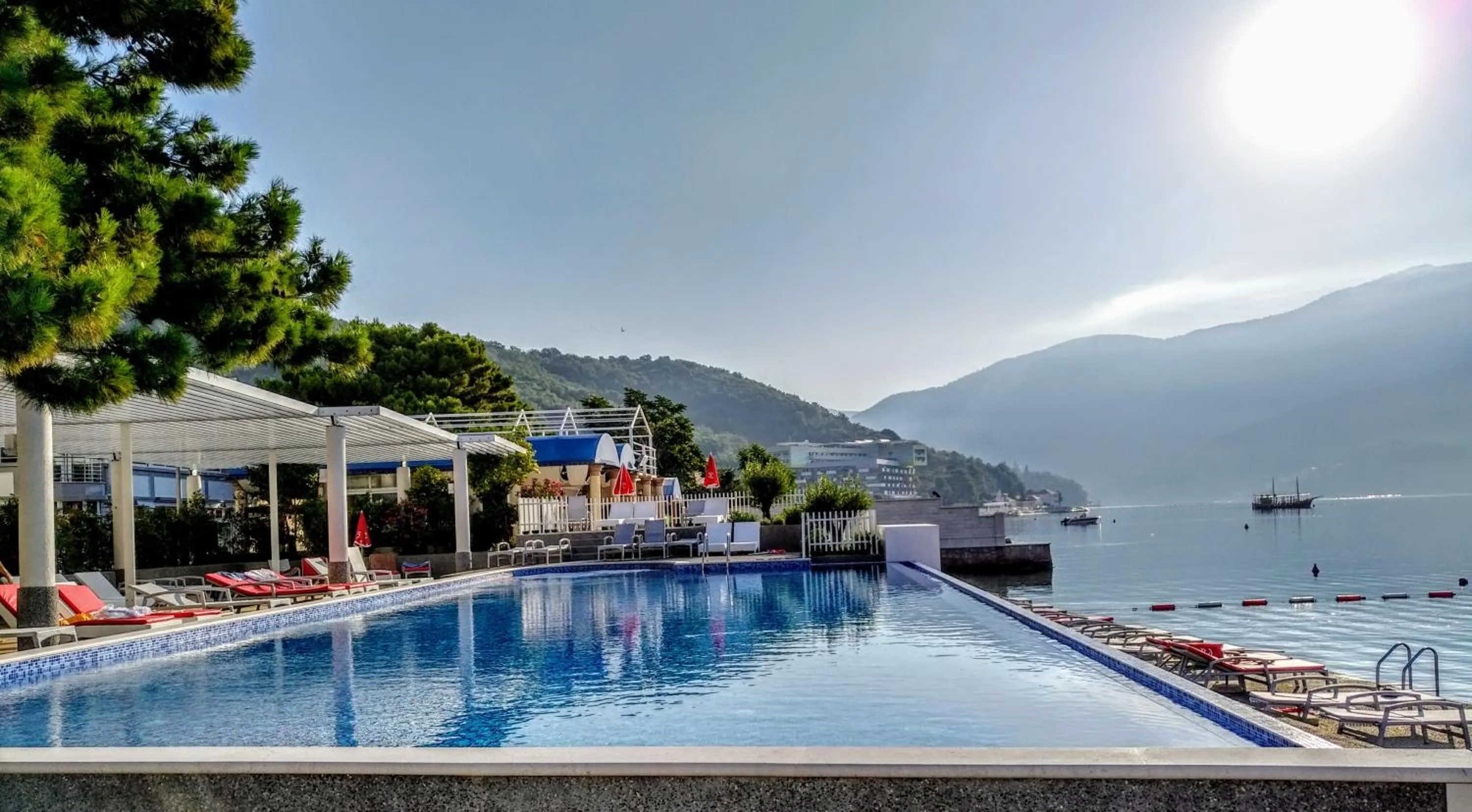 Swimming pool in Carine Hotel Delfin