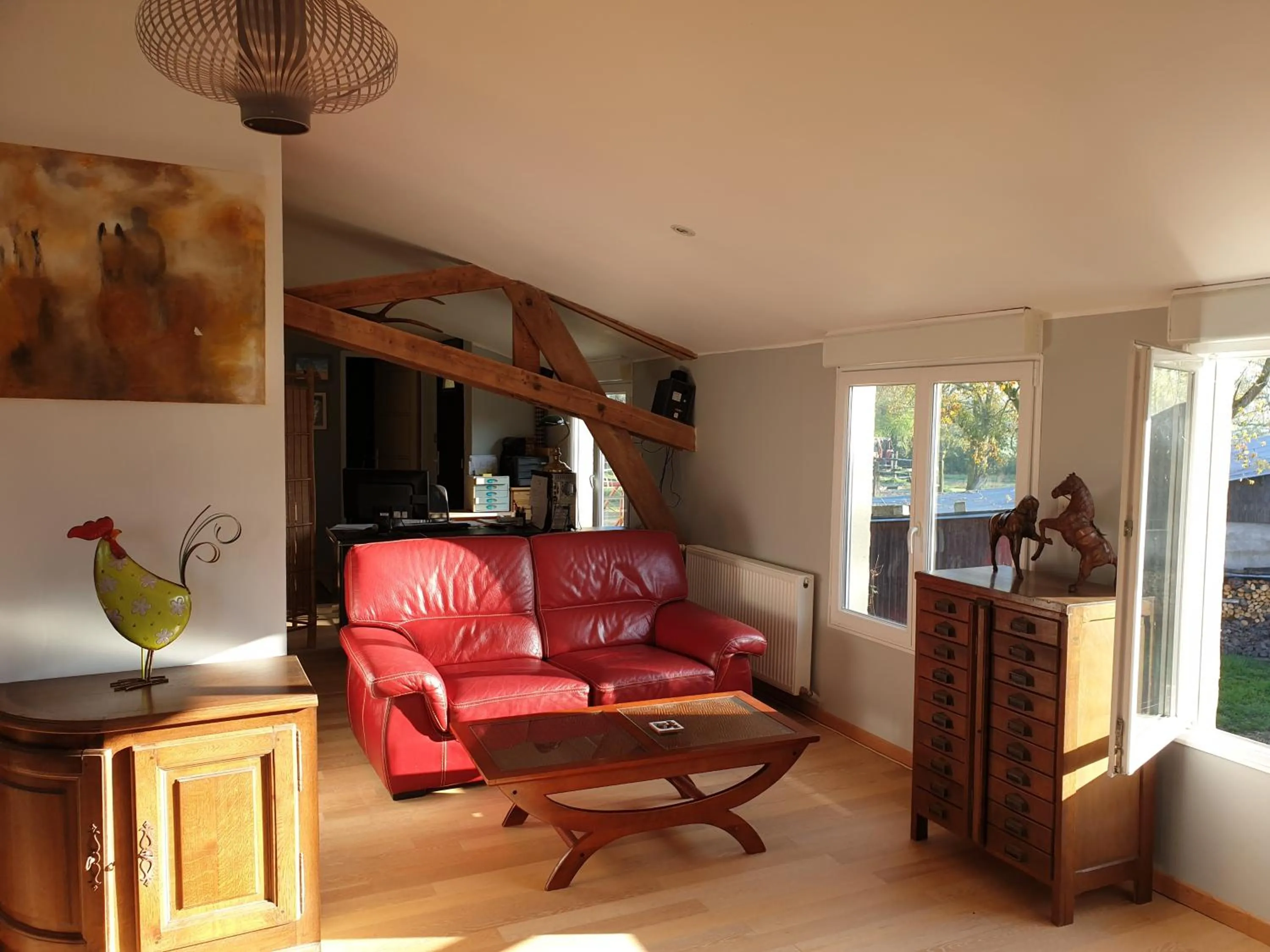 Communal lounge/ TV room in Gîte et Chambre d'hôte de l'élevage du Lattay