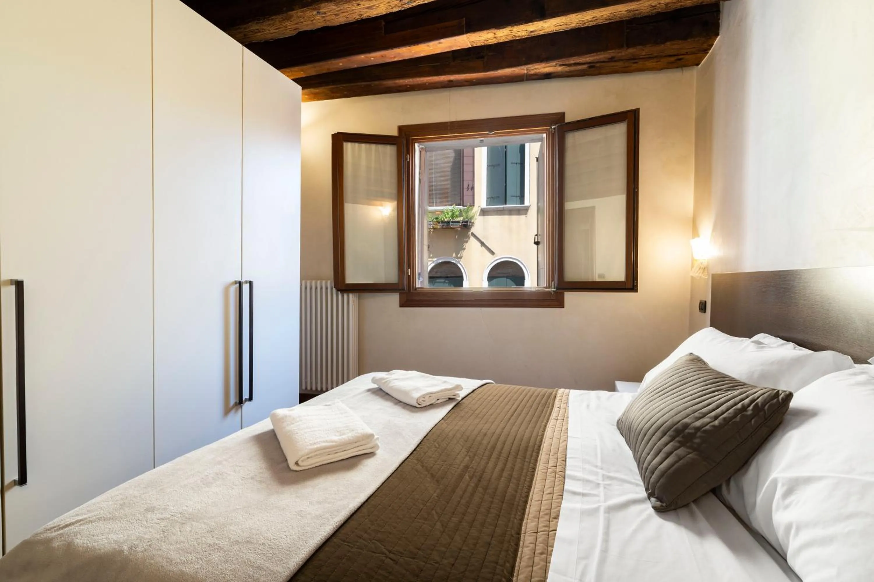 Bedroom, Bed in Doge Morosini Palace by Wonderful Italy