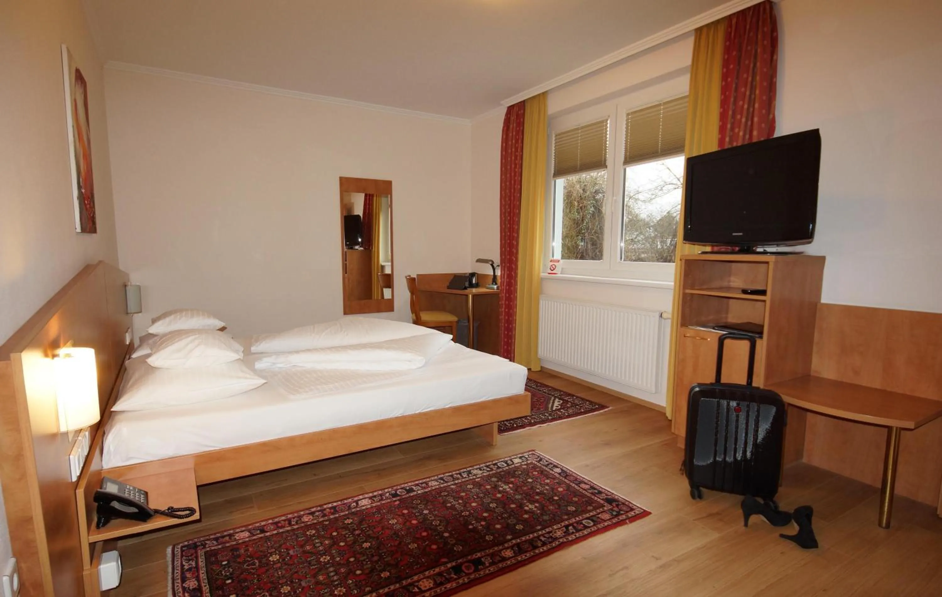 Photo of the whole room, Bed in Der Marienhof Hotel Garni