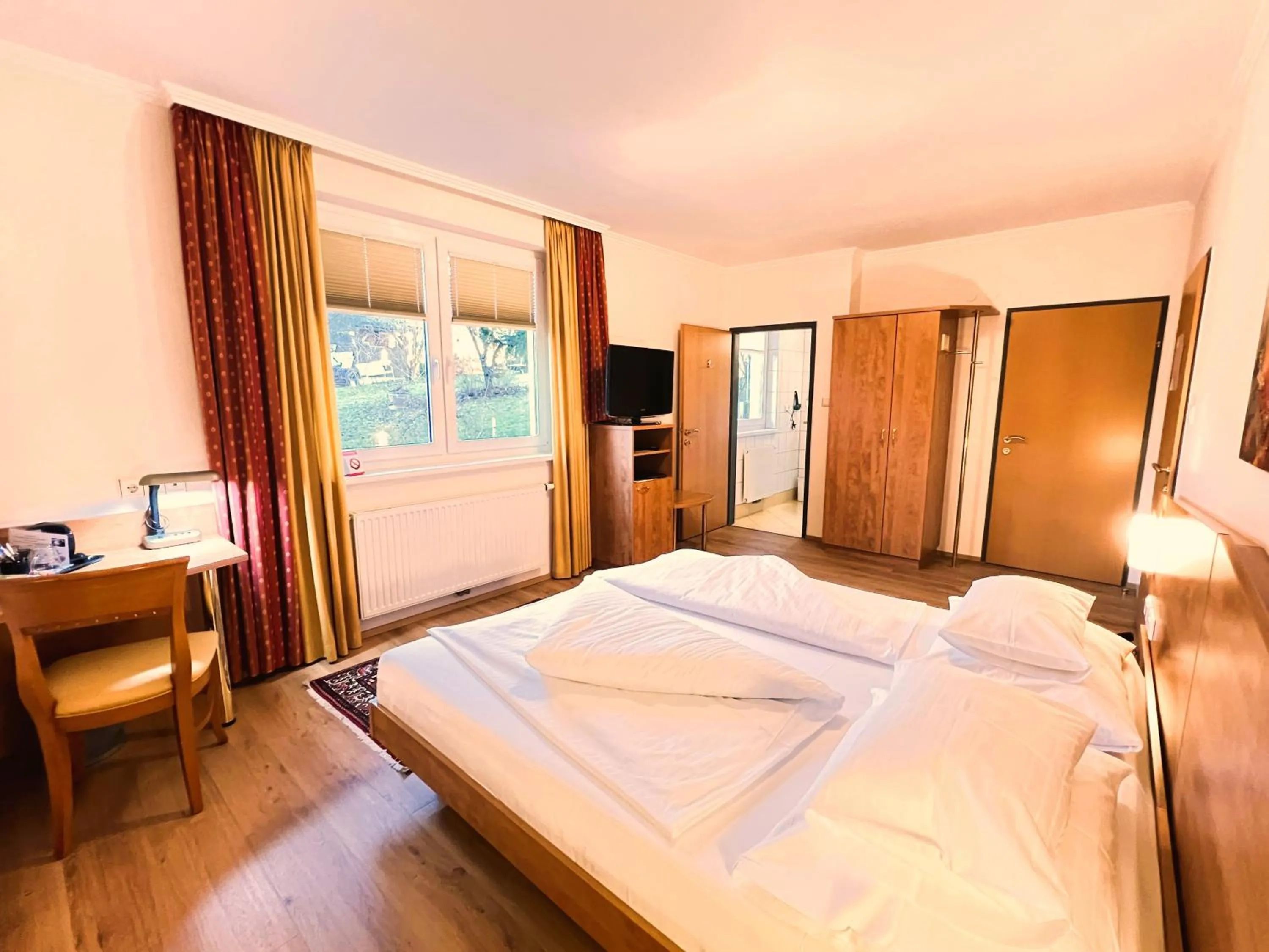 Photo of the whole room, Bed in Der Marienhof Hotel Garni