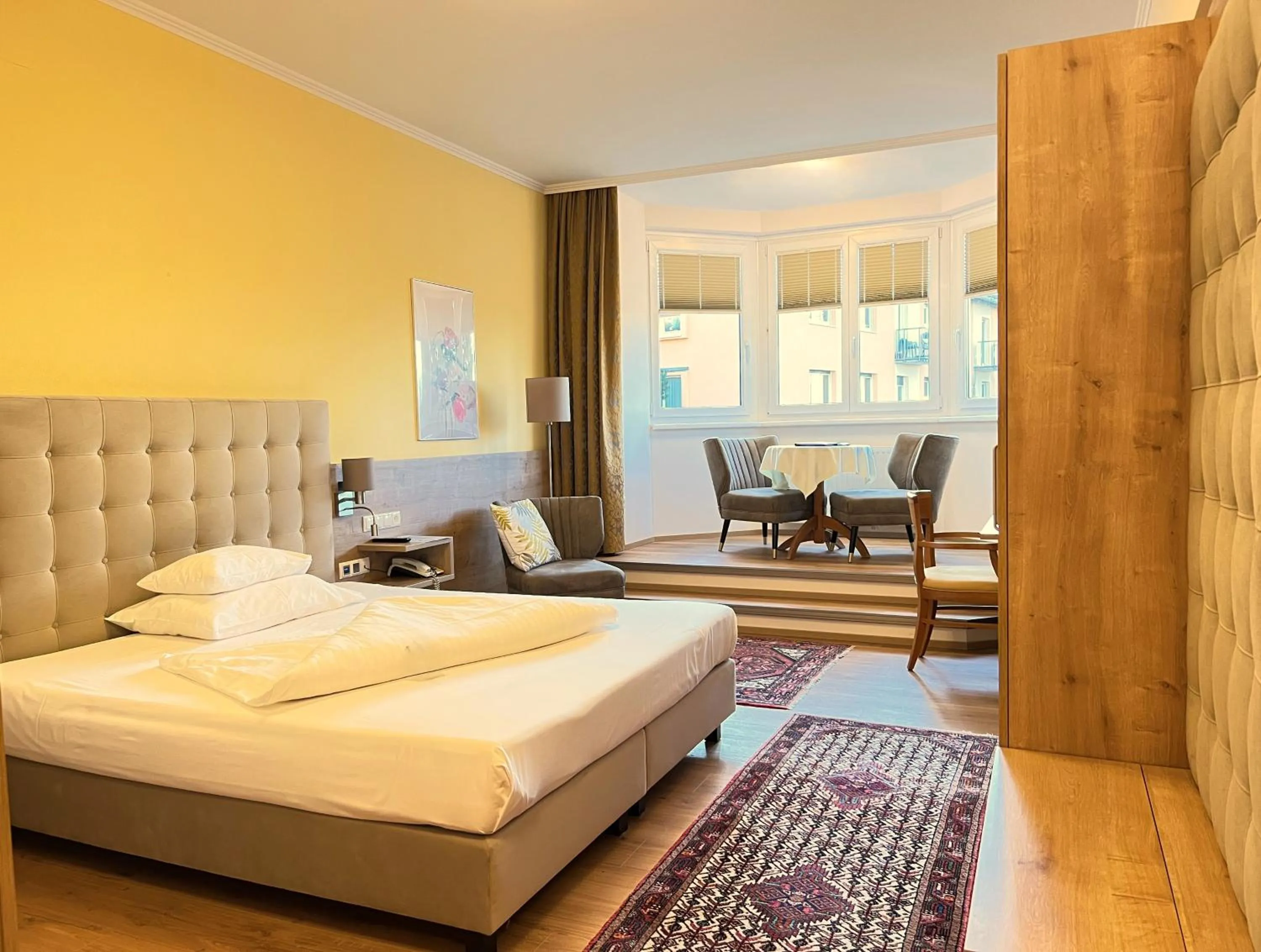 Photo of the whole room, Bed in Der Marienhof Hotel Garni