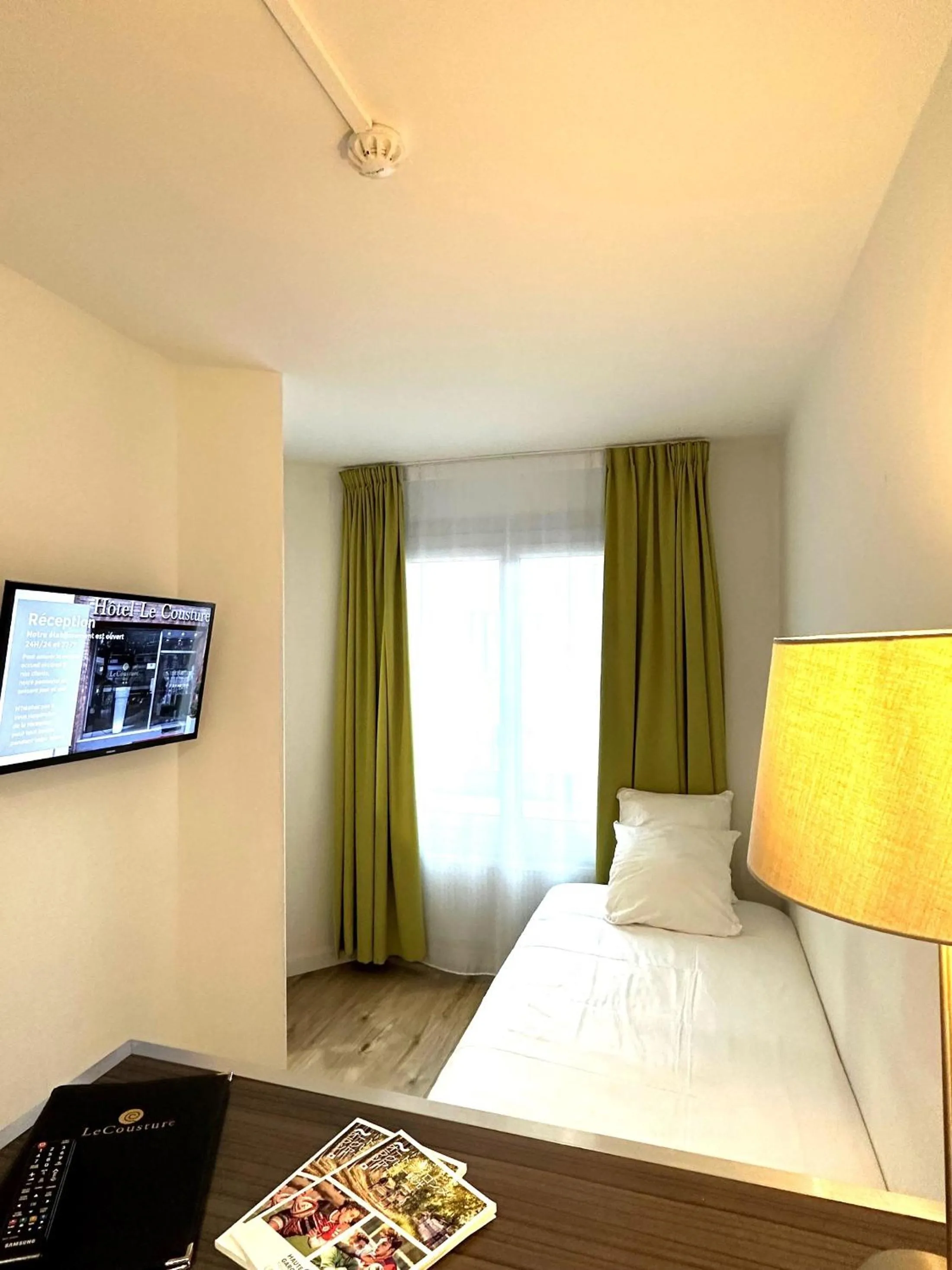 Photo of the whole room, Bed in Hôtel Le Cousture