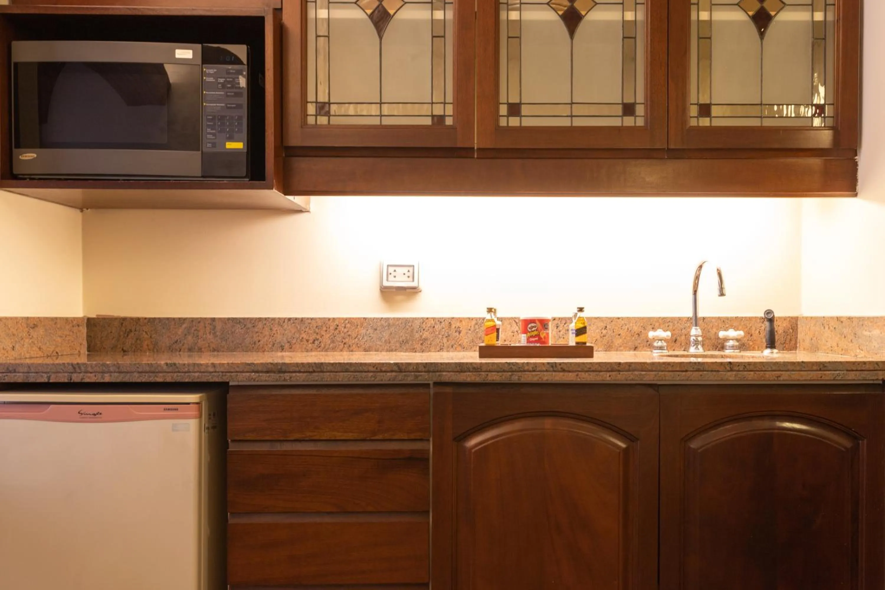 Kitchen or kitchenette in J&A Classic Hotel