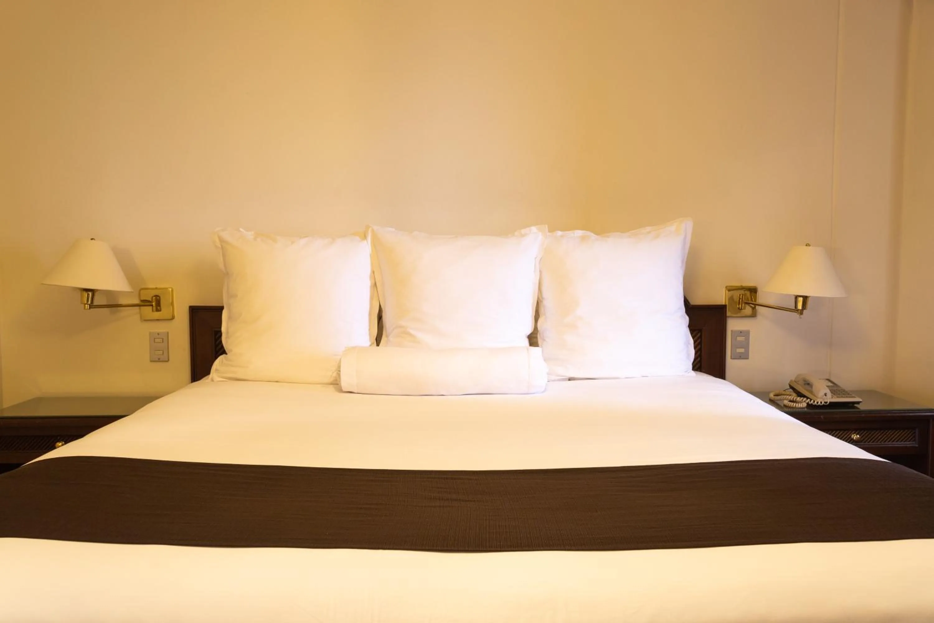 Bed in J&A Classic Hotel