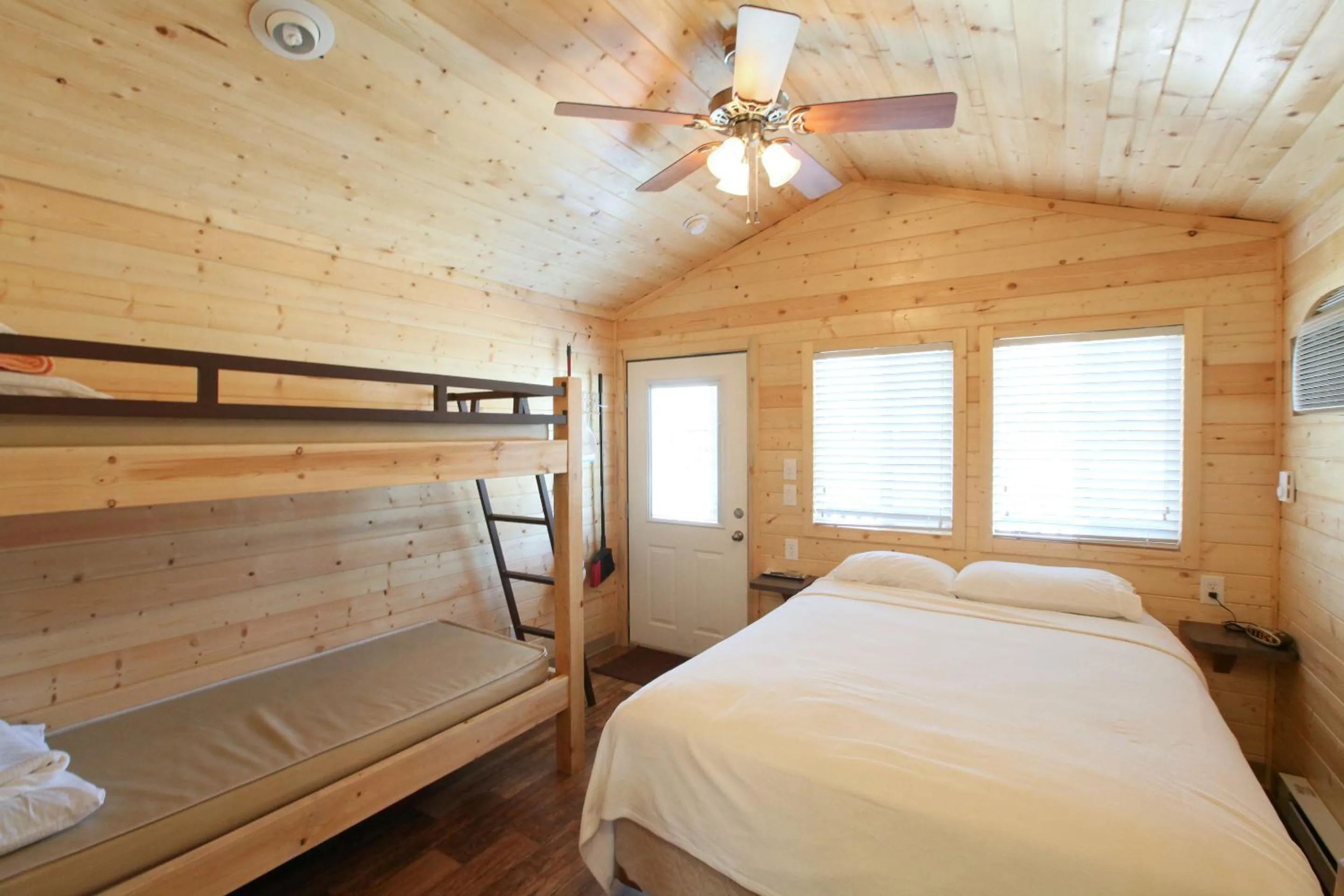 Bed in Lake Conroe Queen Studio Cabin 5