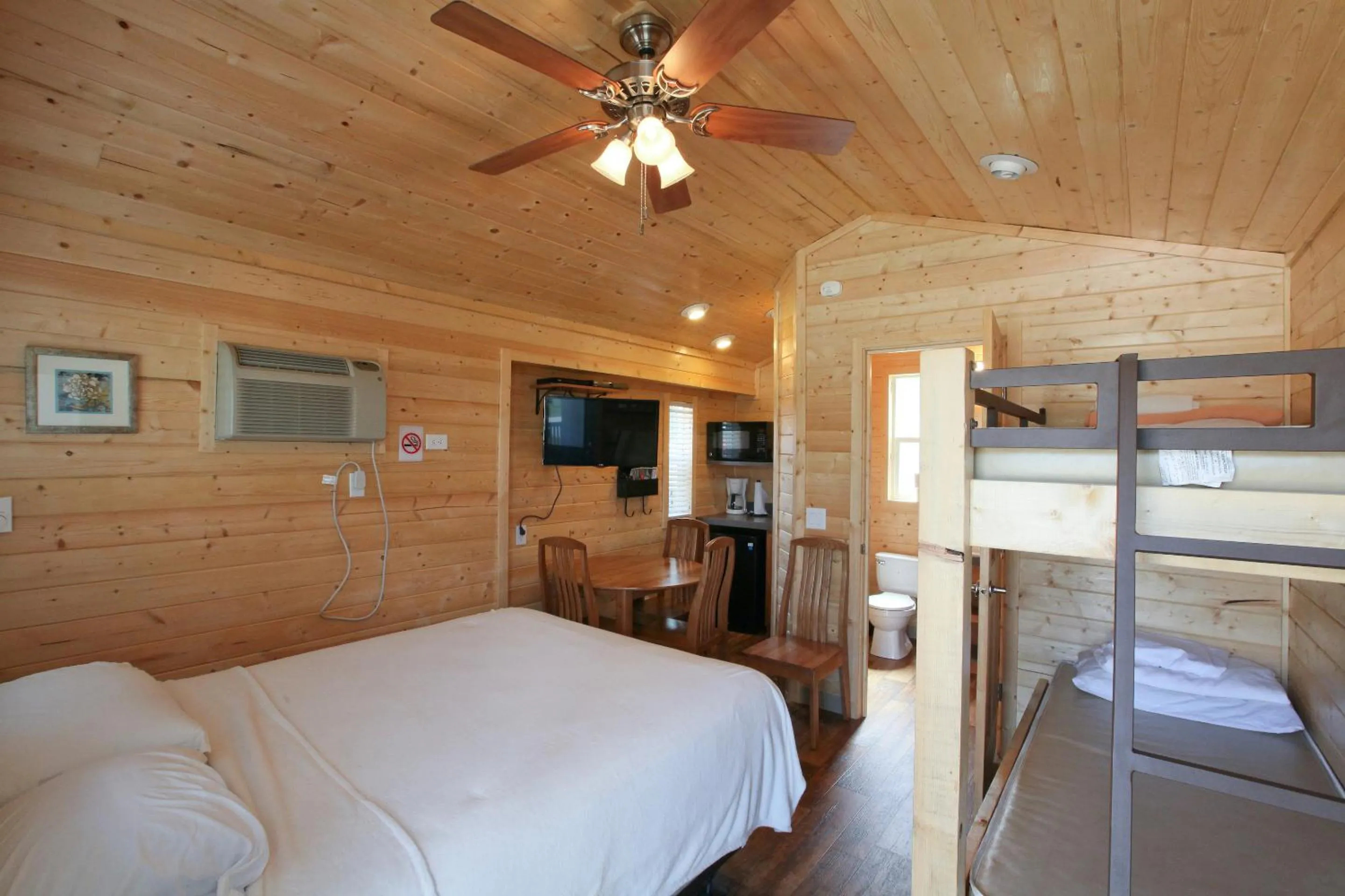 Bed in Lake Conroe Queen Studio Cabin 5