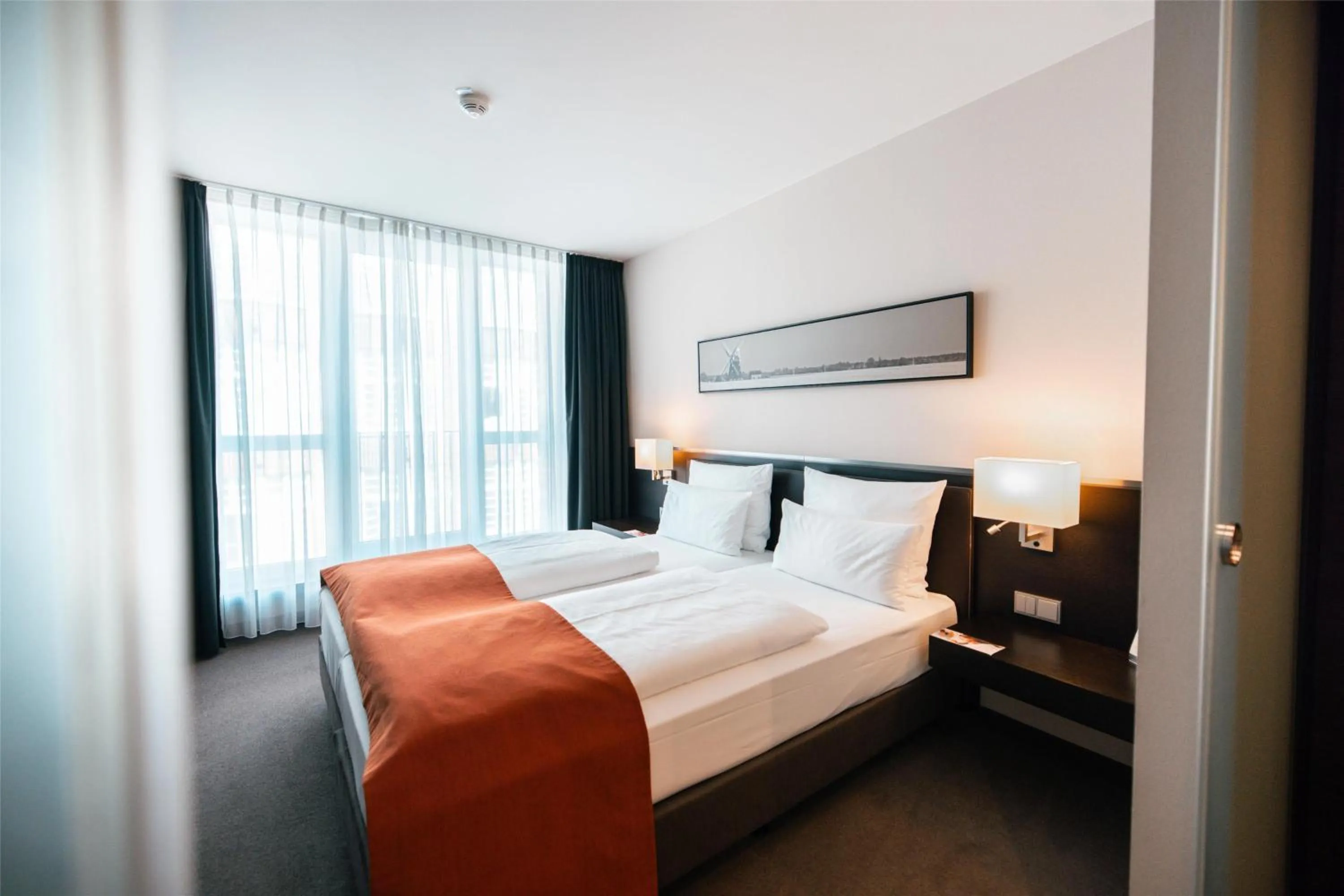 Photo of the whole room, Bed in ATLANTIC Hotel Lübeck