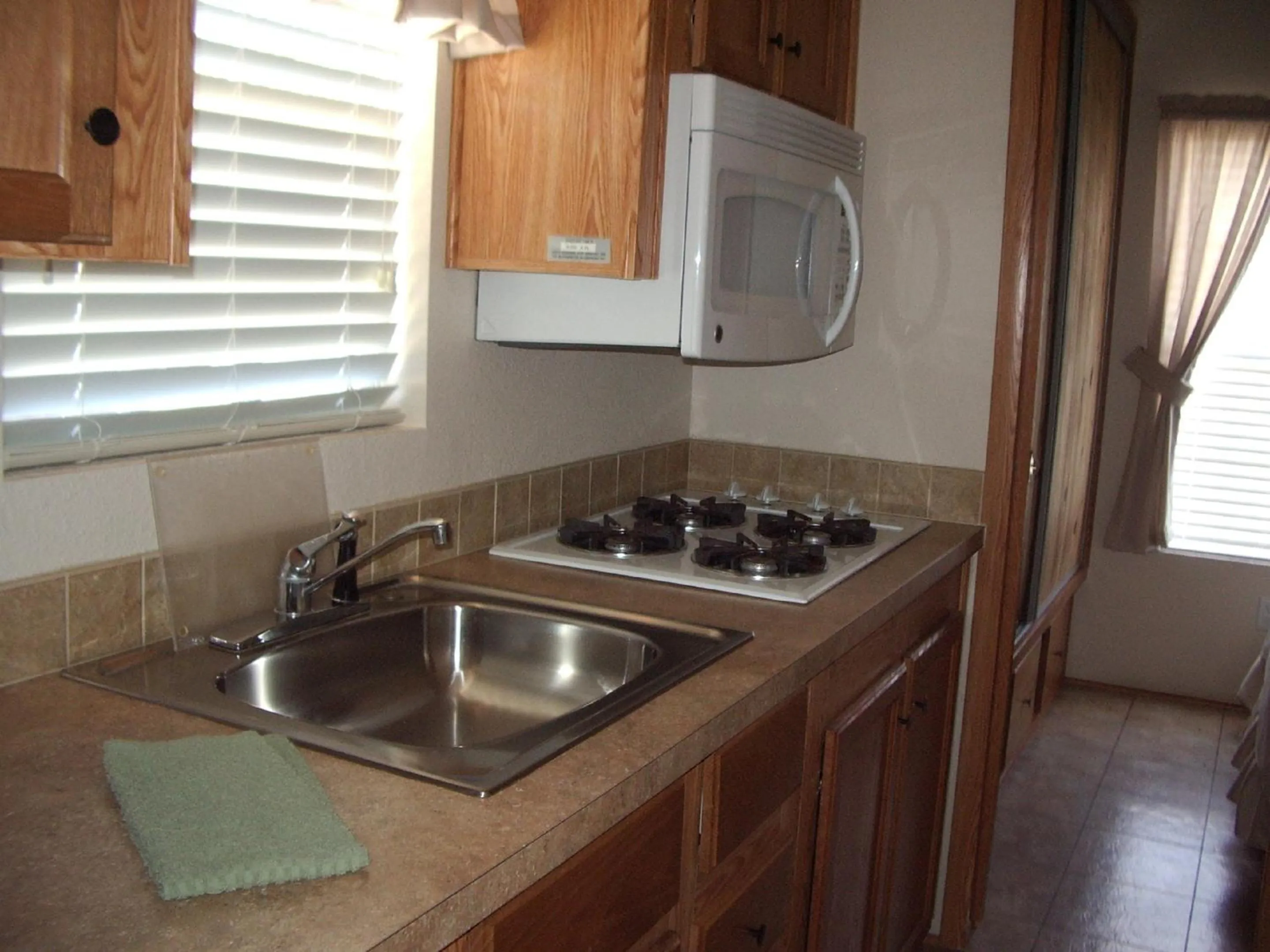 Kitchen or kitchenette in Verde Valley One-Bedroom Park Model Cabin 14