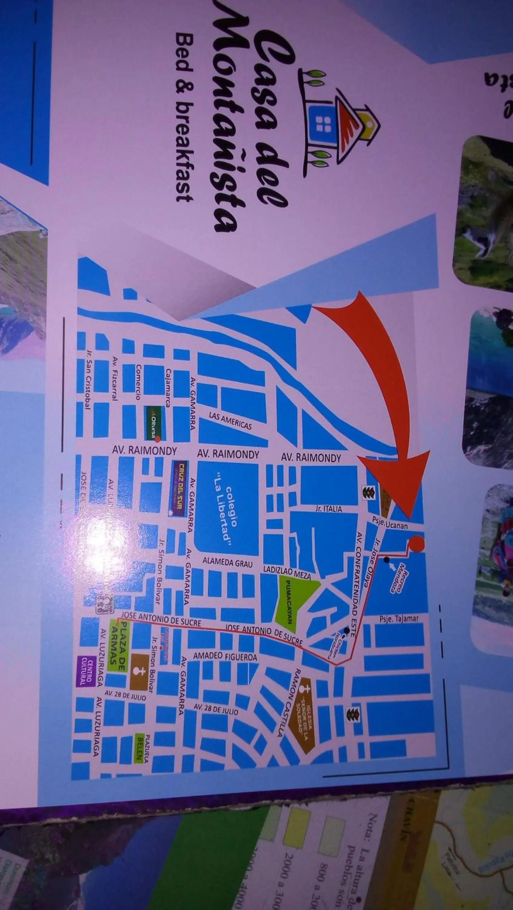 Text overlay in Hostal Casa del Montañista