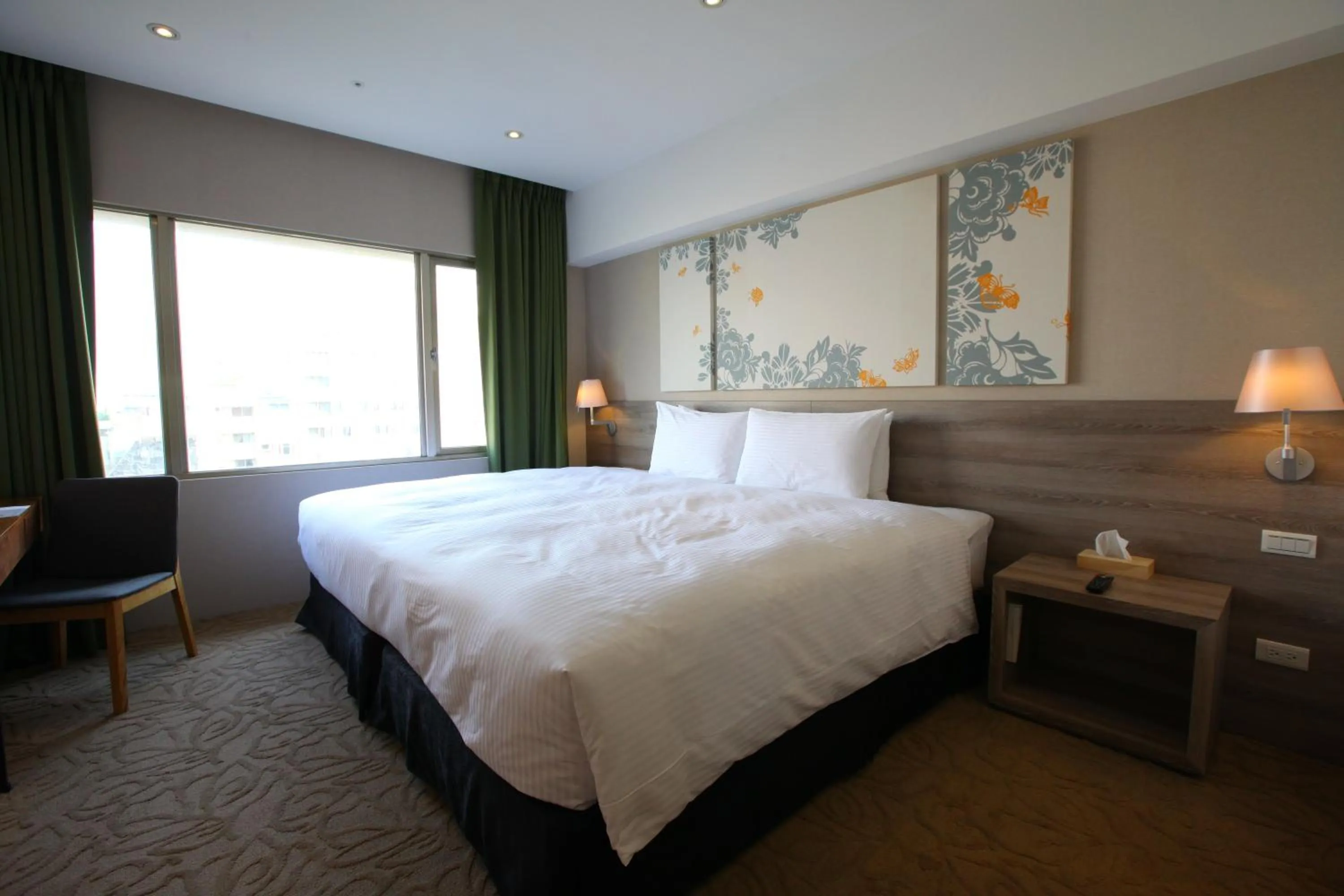 Bed in Aeris International Hotel