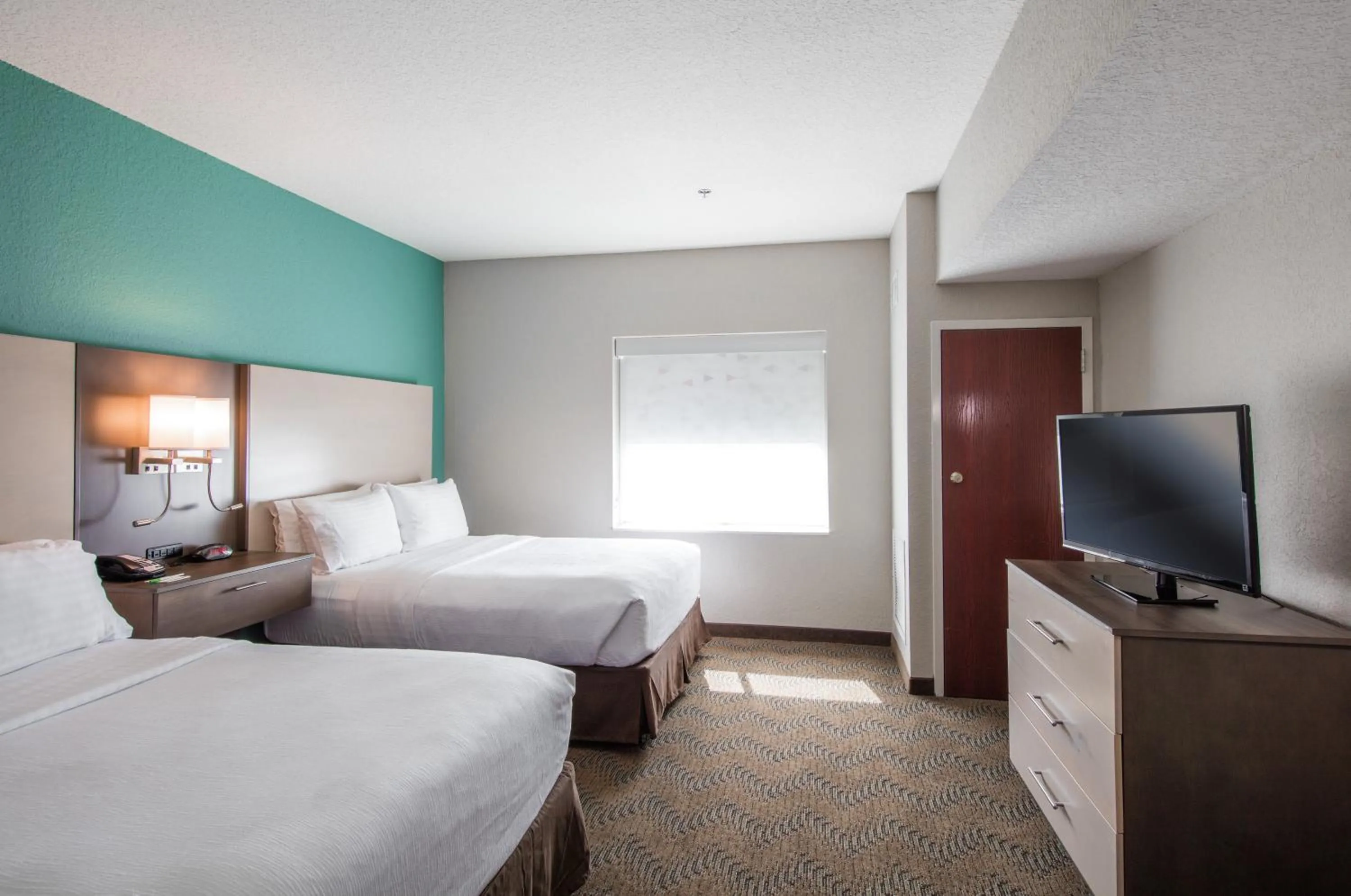 Photo of the whole room, Bed in Holiday Inn & Suites Lake City by IHG