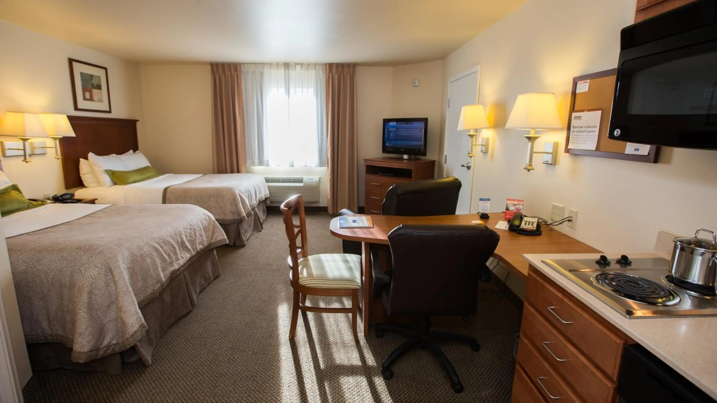 Photo of the whole room, Bed in Candlewood Suites Joplin by IHG