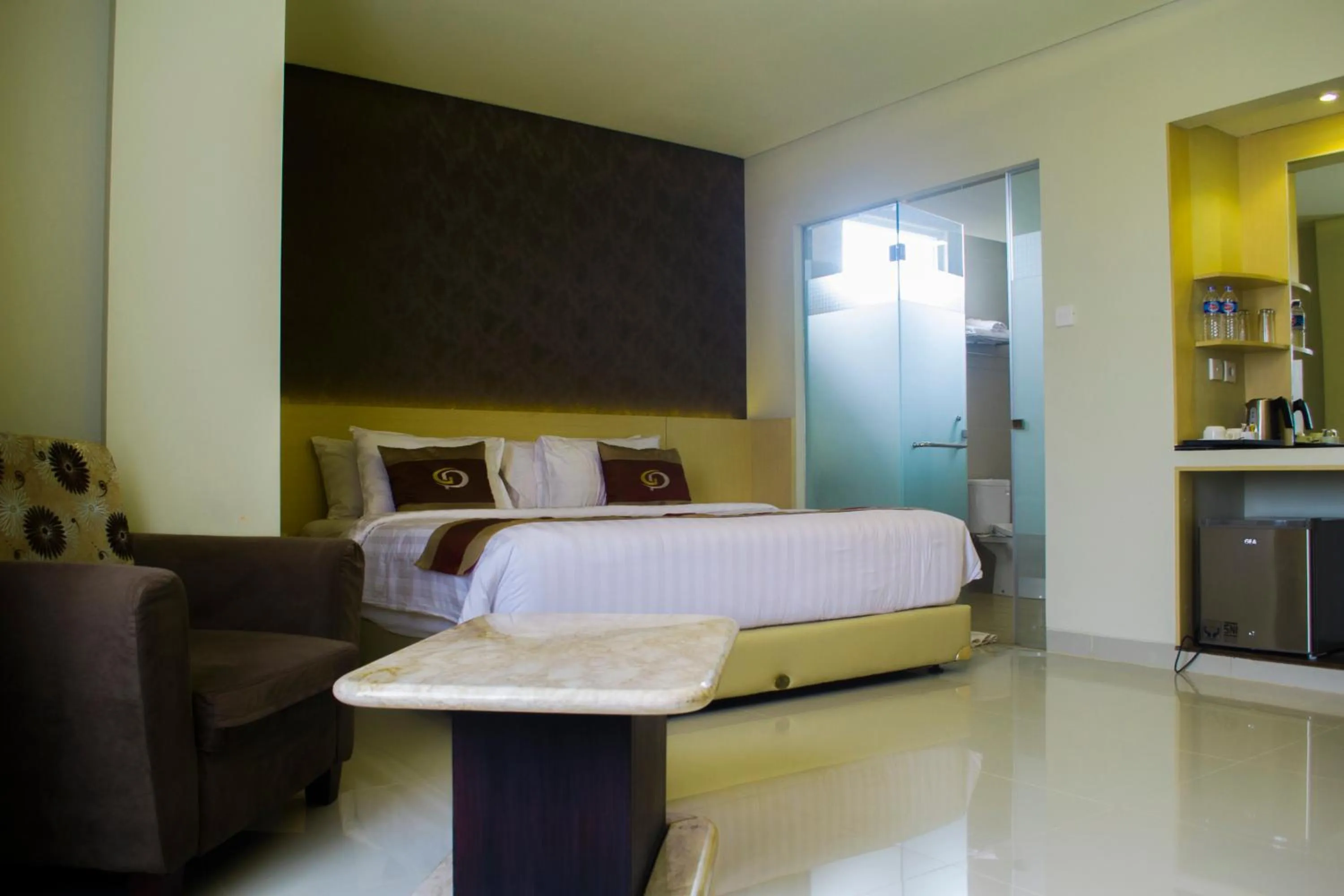 Bed in Grand Parama Hotel