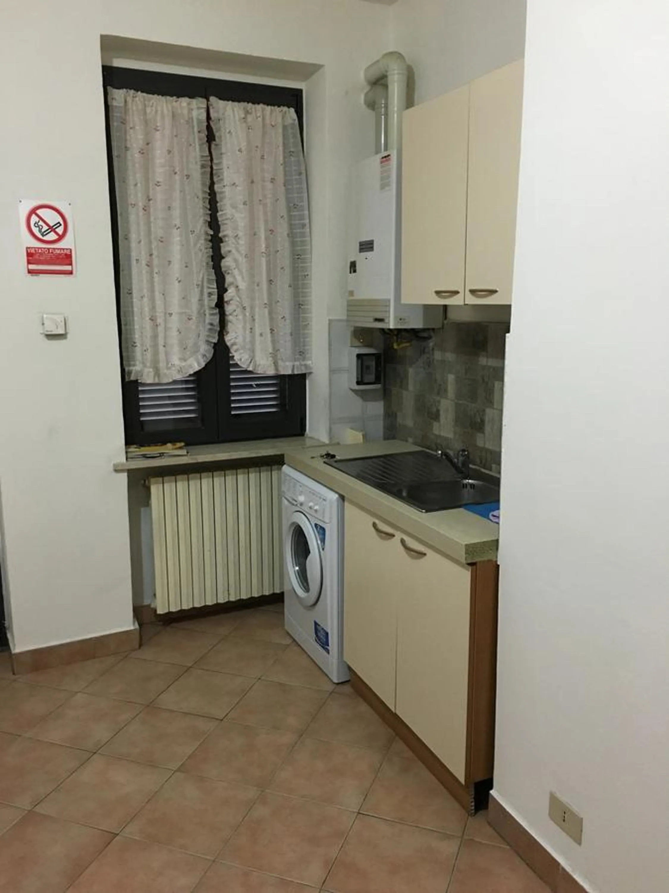 Communal lounge/ TV room in B&B Libertà