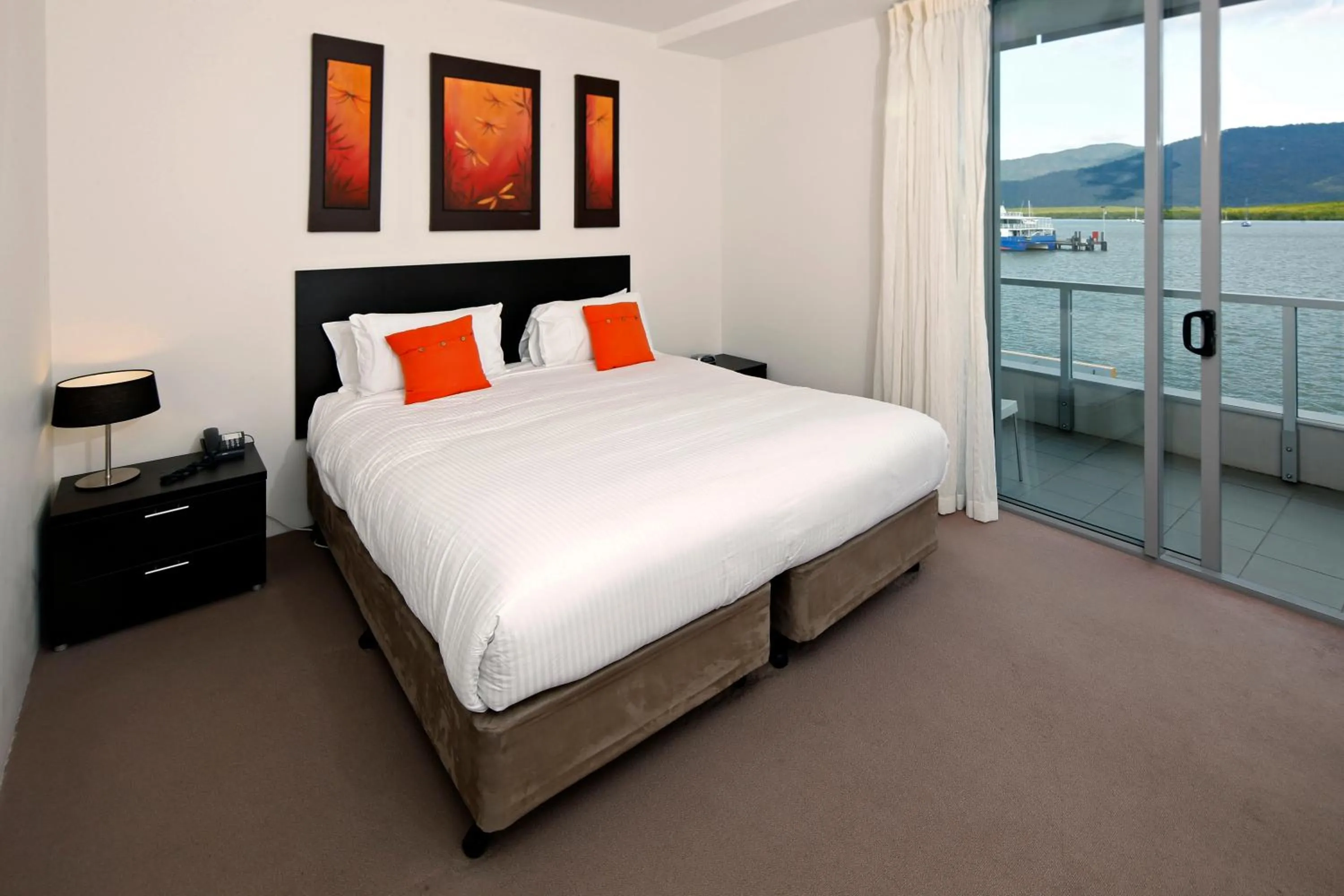 Bed in Cairns Private Apartments