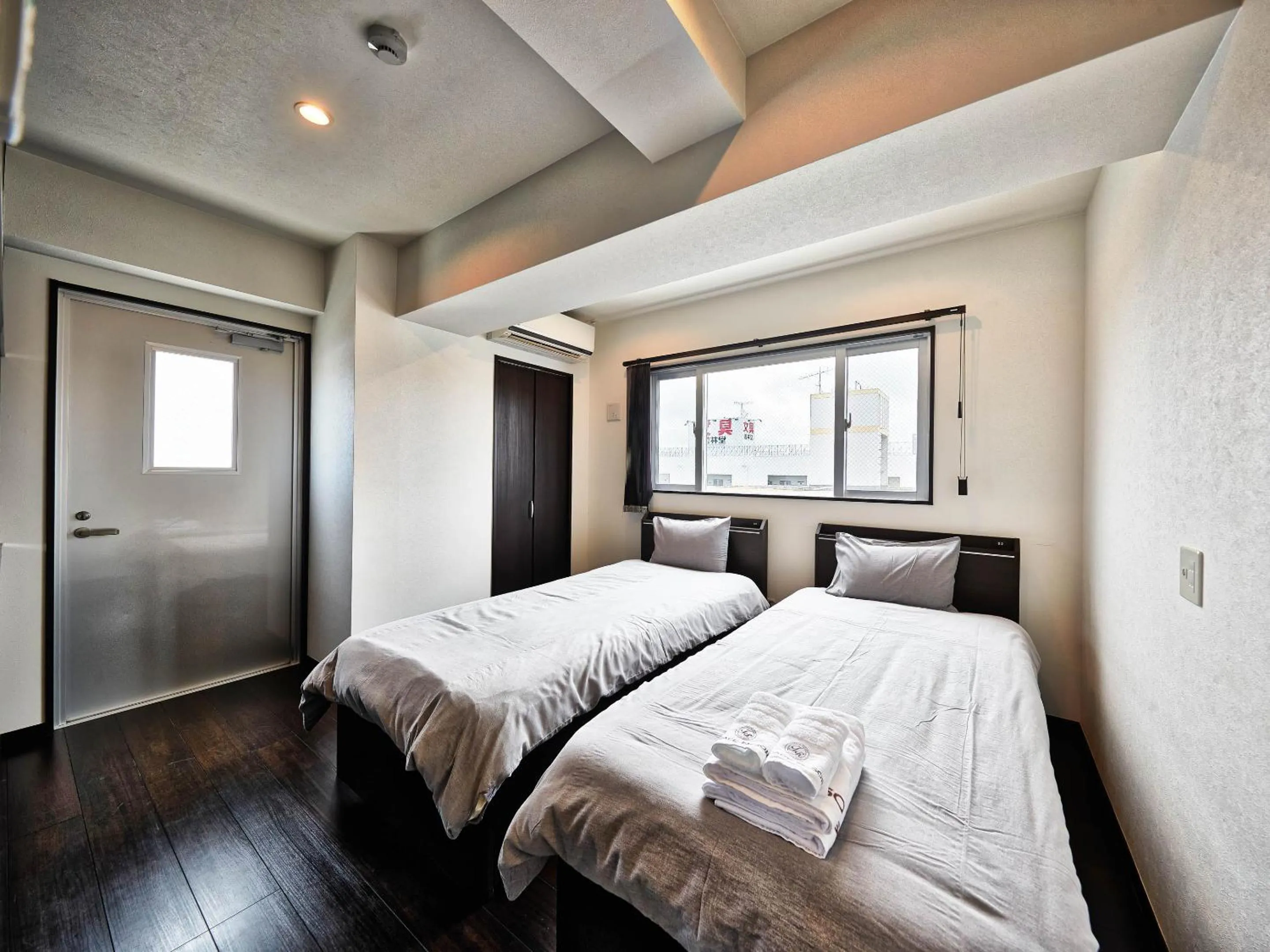 Bed in Terrace Resort Shintoshin