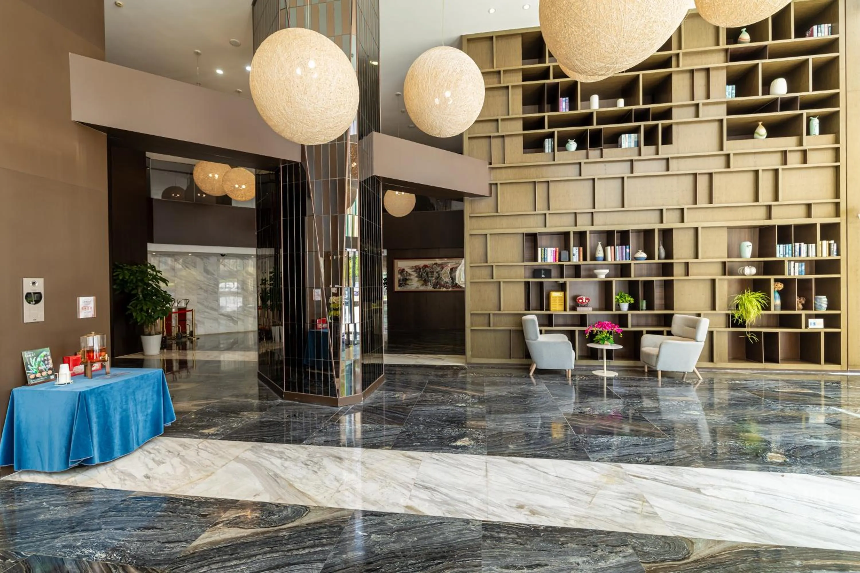 Lobby or reception in Green Court Residence Jinqiao Diamond Shanghai