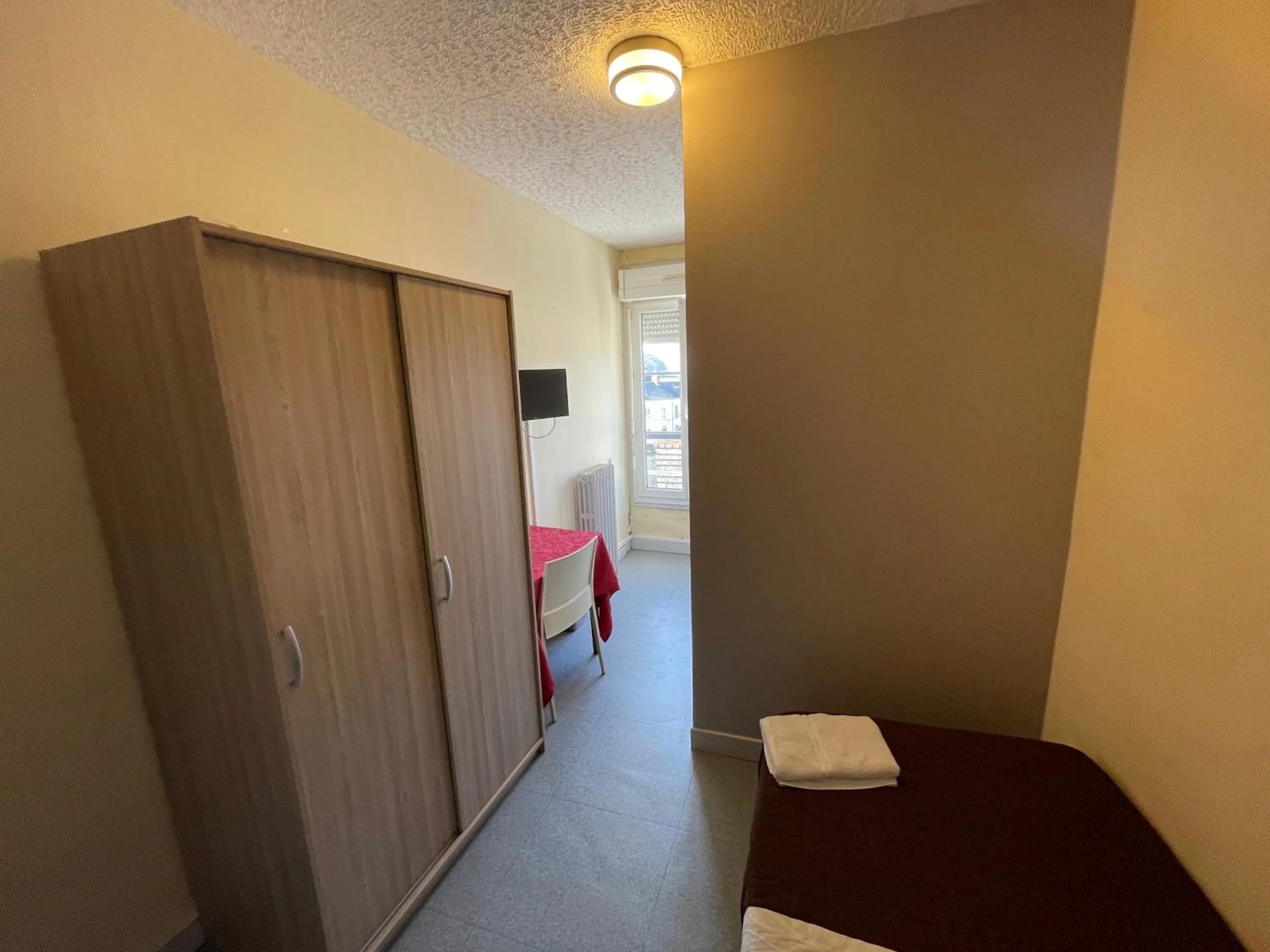 wardrobe, Bed in Le Sporting