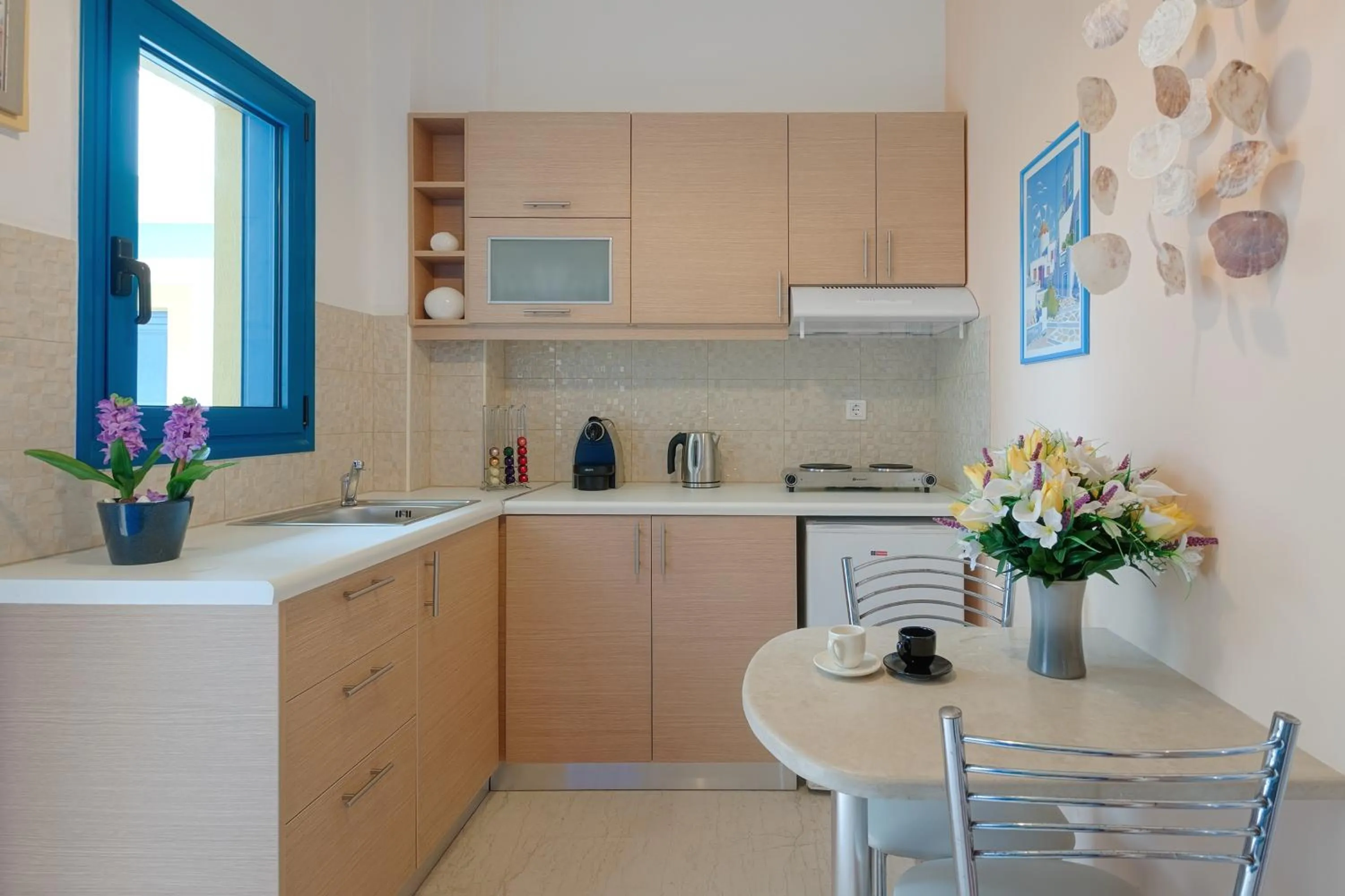 Kitchen or kitchenette in Pyrgos Beach Hotel Apartments