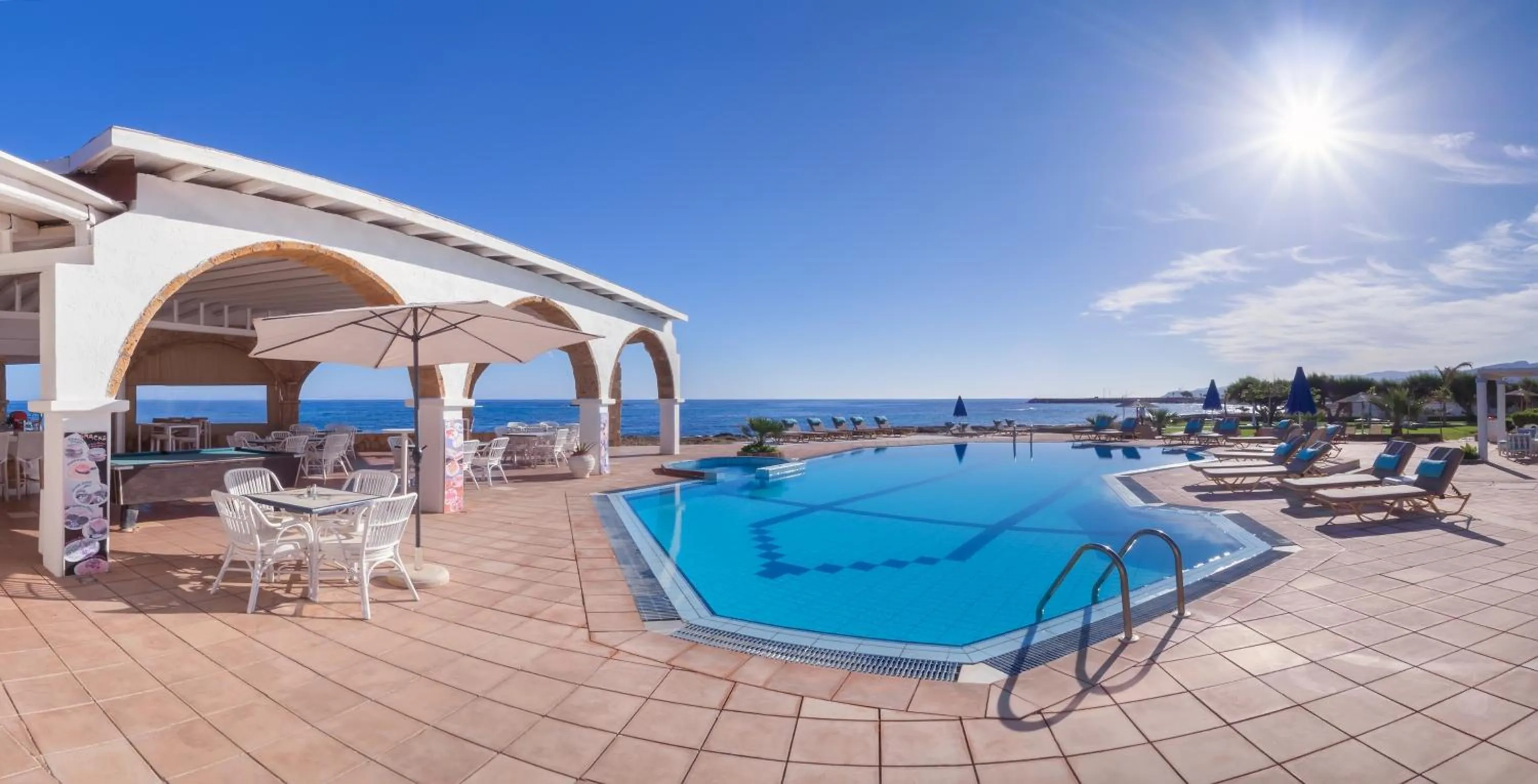 Swimming pool in Pyrgos Beach Hotel Apartments