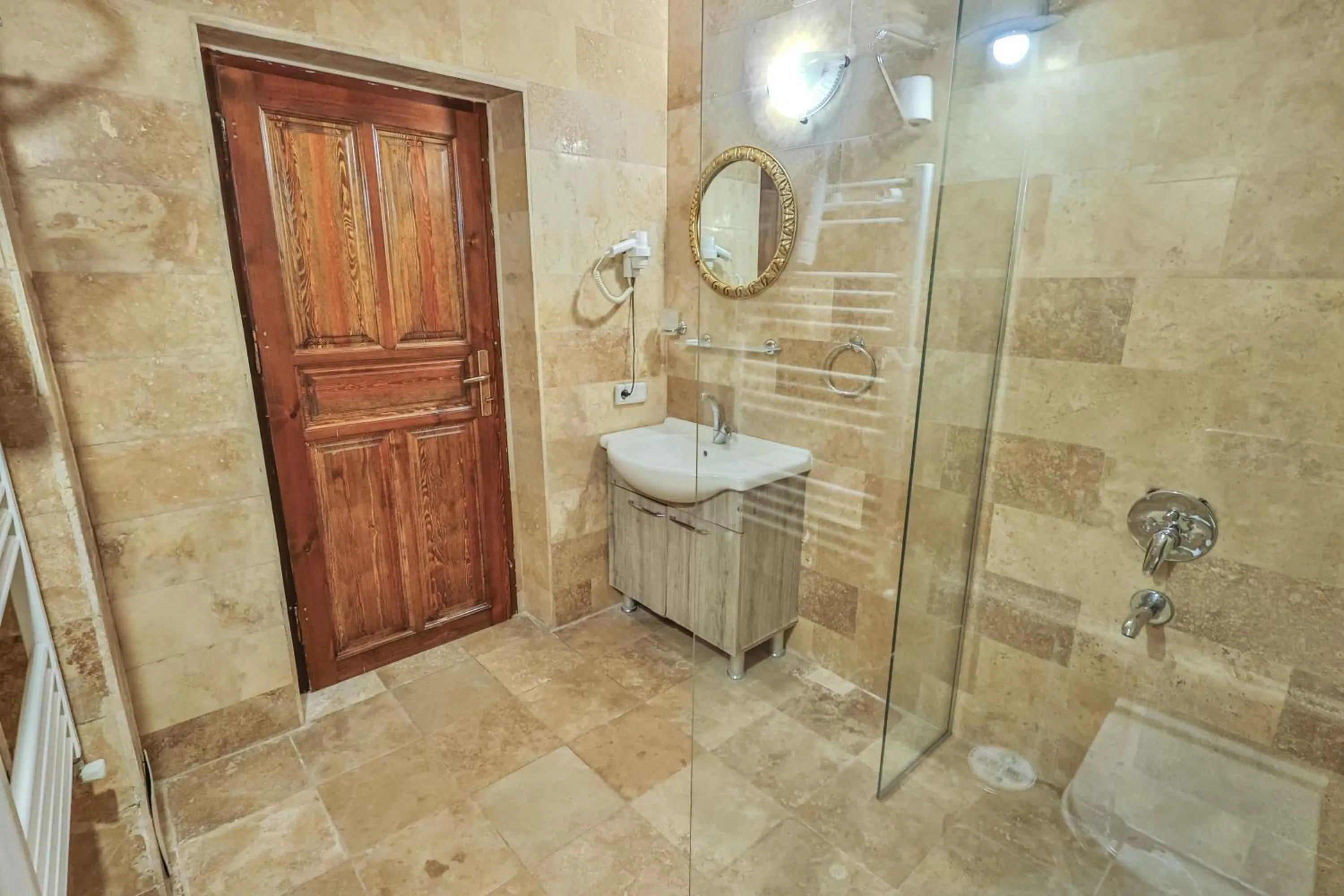 Shower in Bedrock Cave Hotel