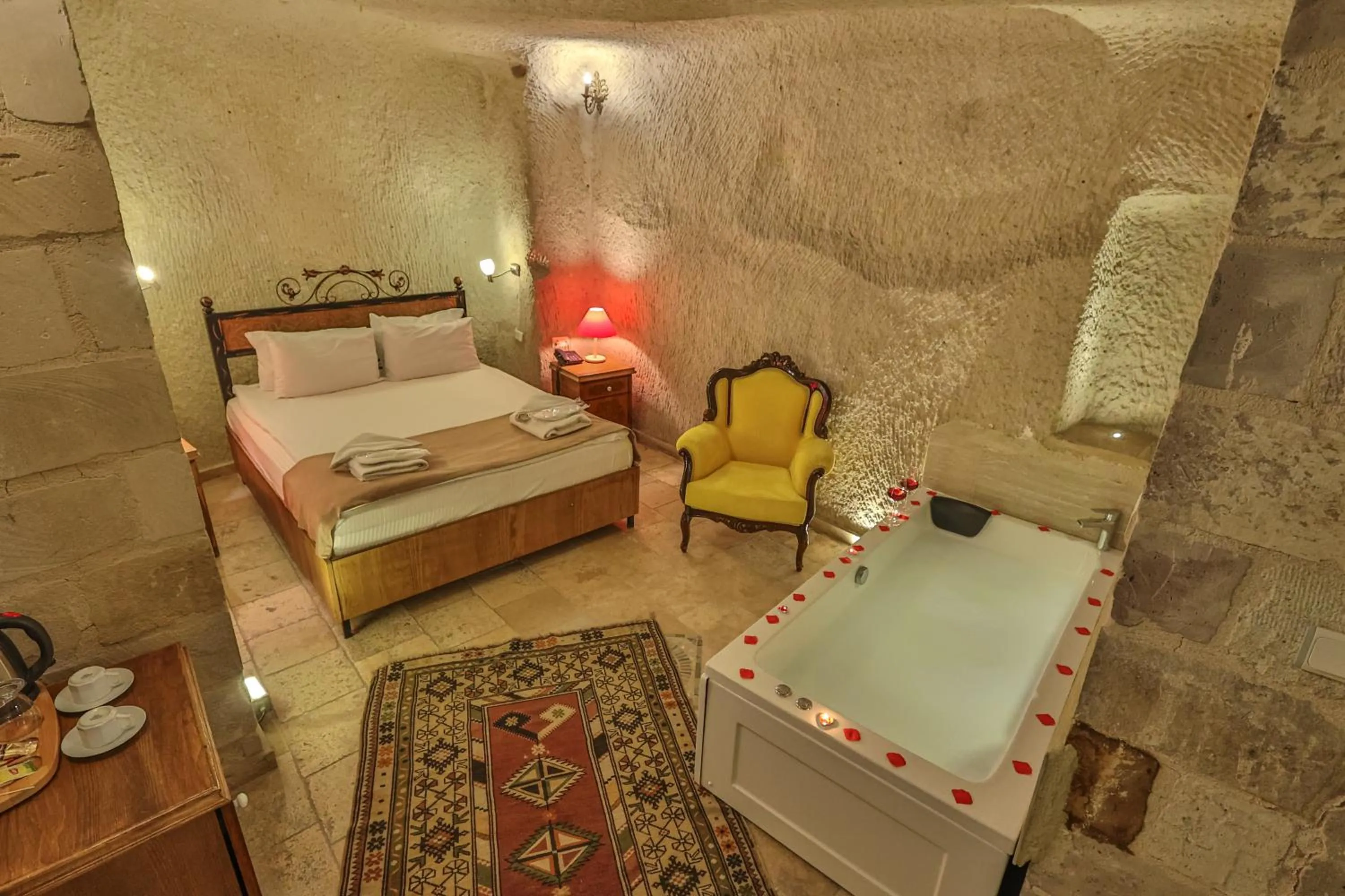 Bed in Bedrock Cave Hotel