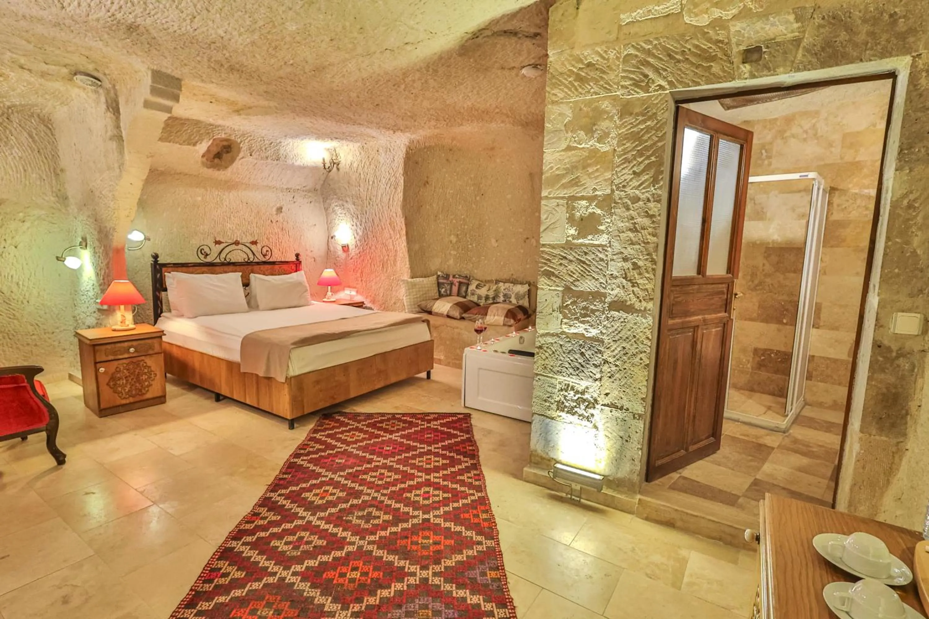 Bed in Bedrock Cave Hotel